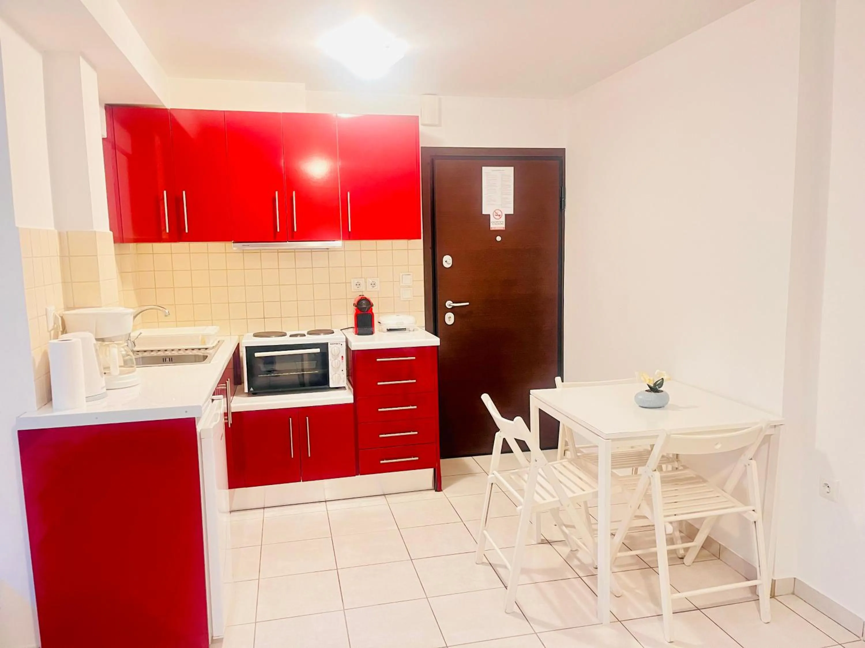 Kitchen or kitchenette in Elvita Apartments