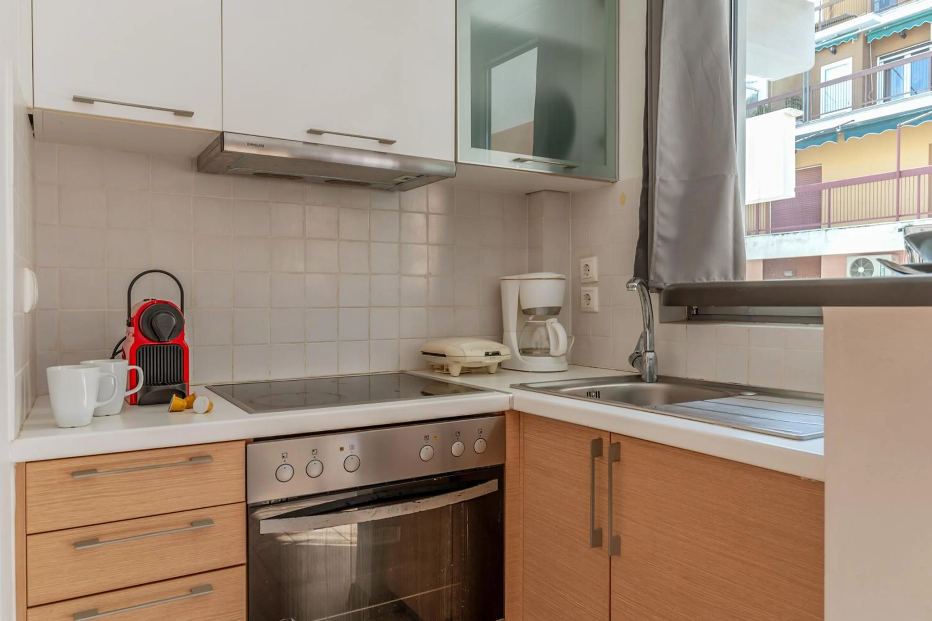 Kitchen or kitchenette in Elvita Apartments