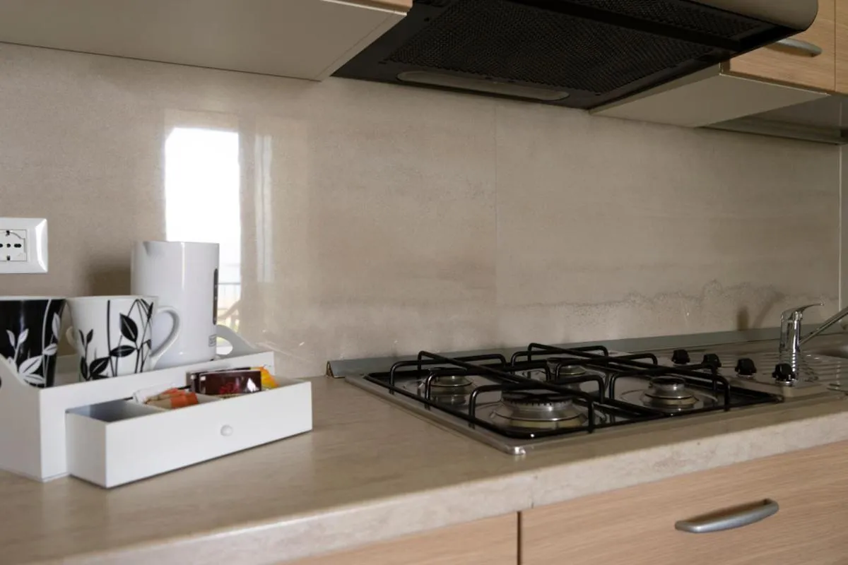 Kitchen or kitchenette in Appartamenti Residence Tulipano