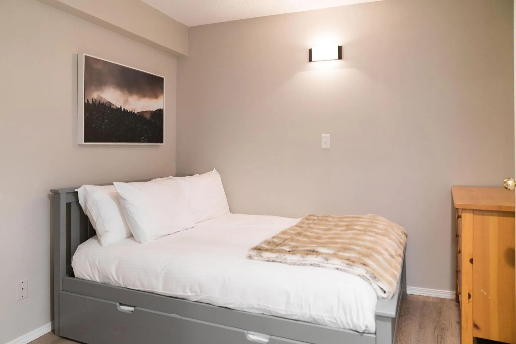 Bed in Gibbons Life Accommodations