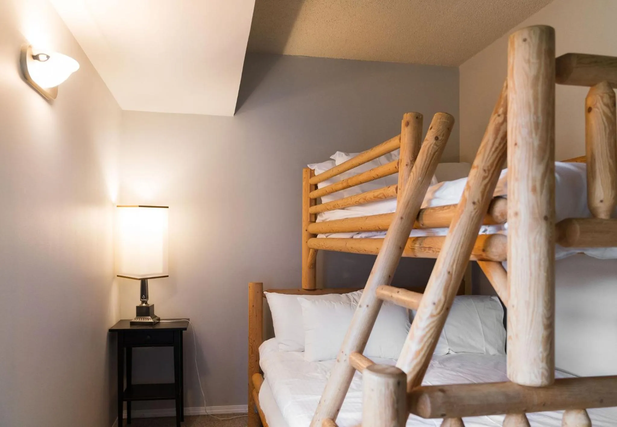 Bed in Gibbons Life Accommodations