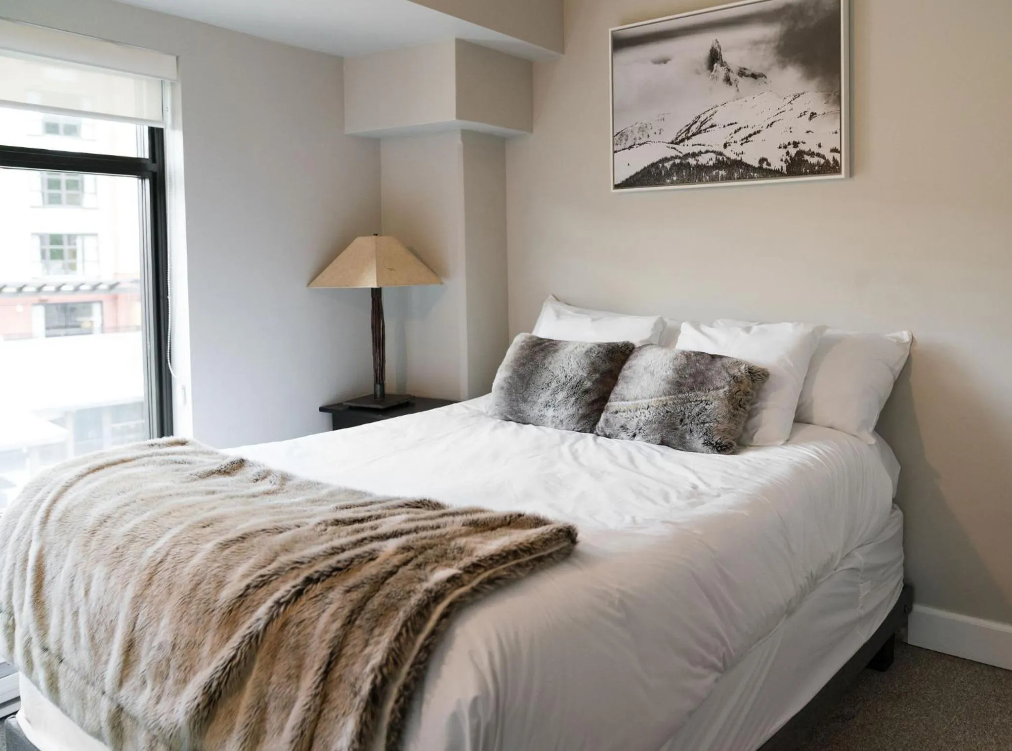 Bed in Gibbons Life Accommodations