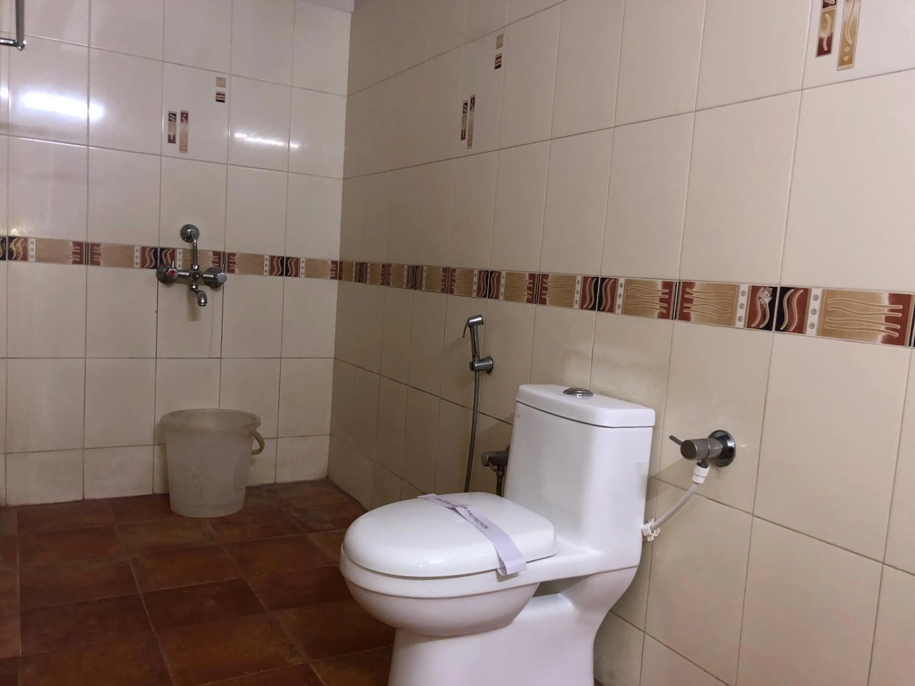 Toilet in New Cape Hotel