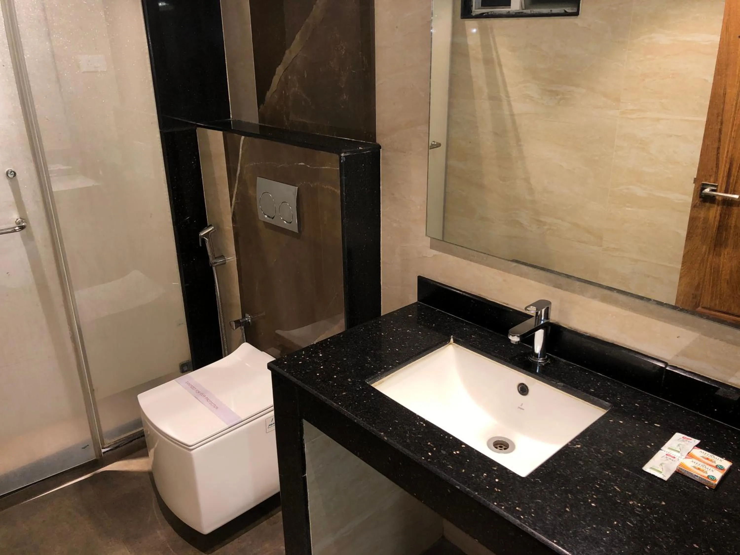 Toilet in New Cape Hotel