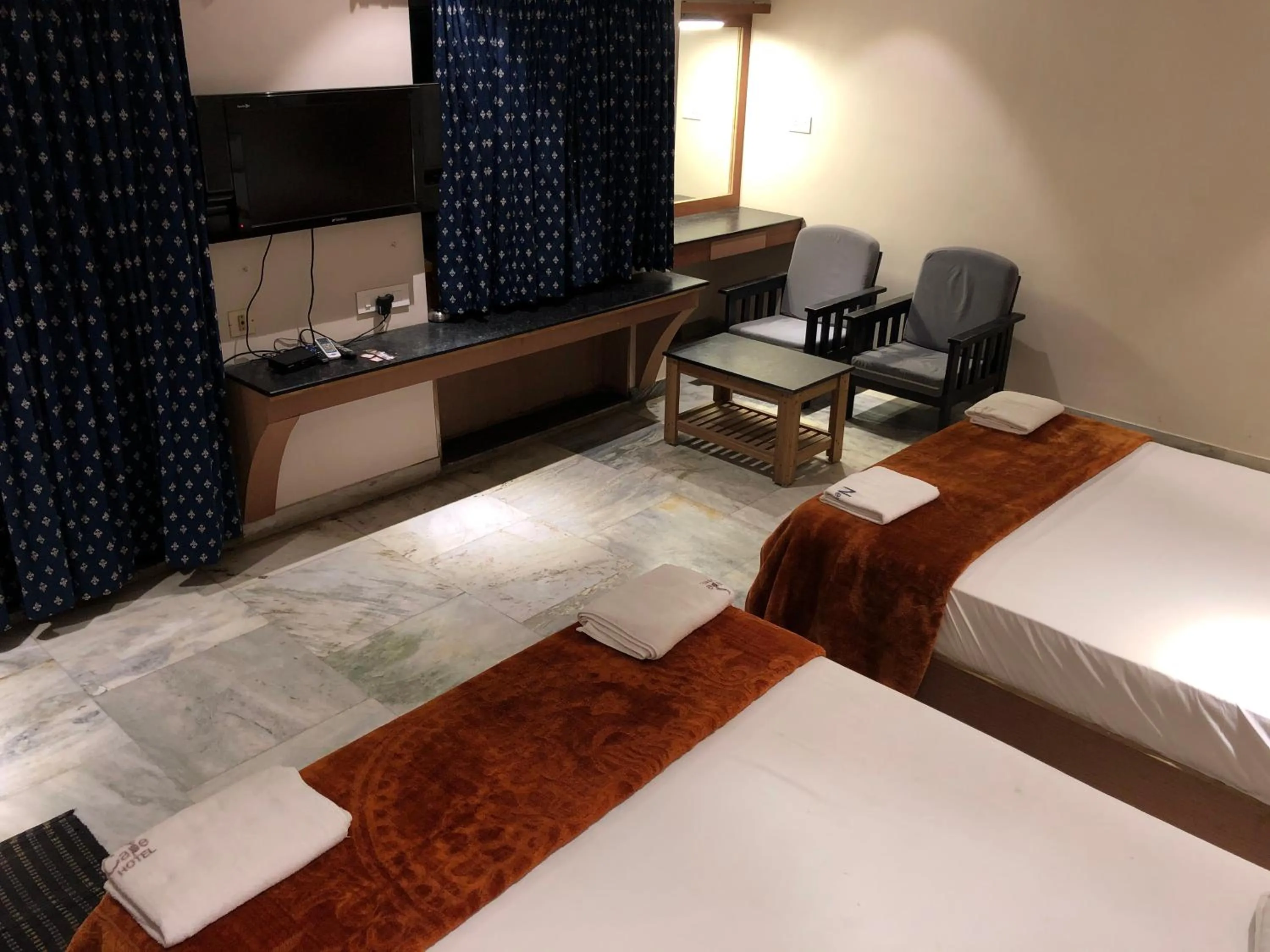 Bed in New Cape Hotel