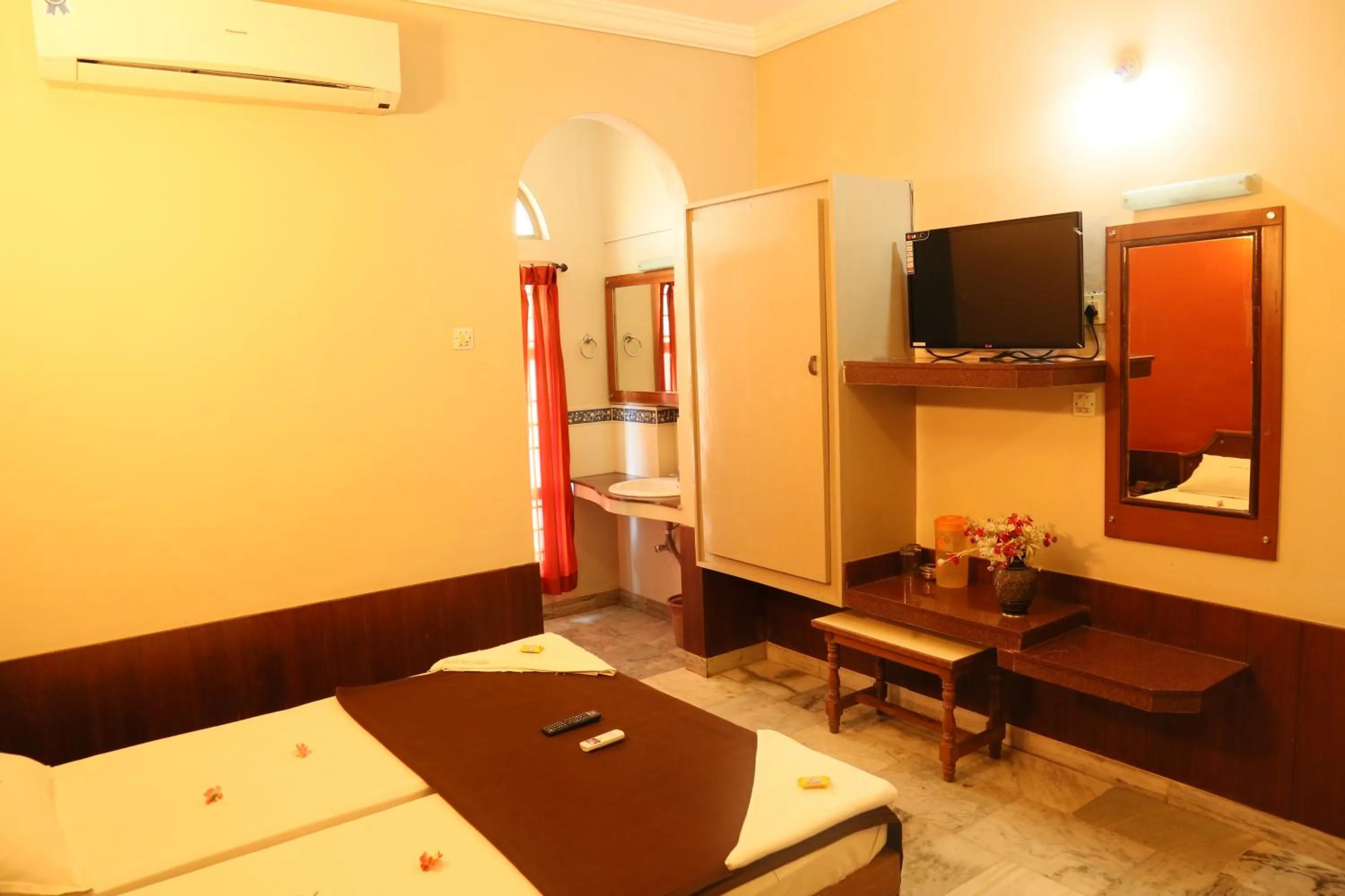 Bed in New Cape Hotel