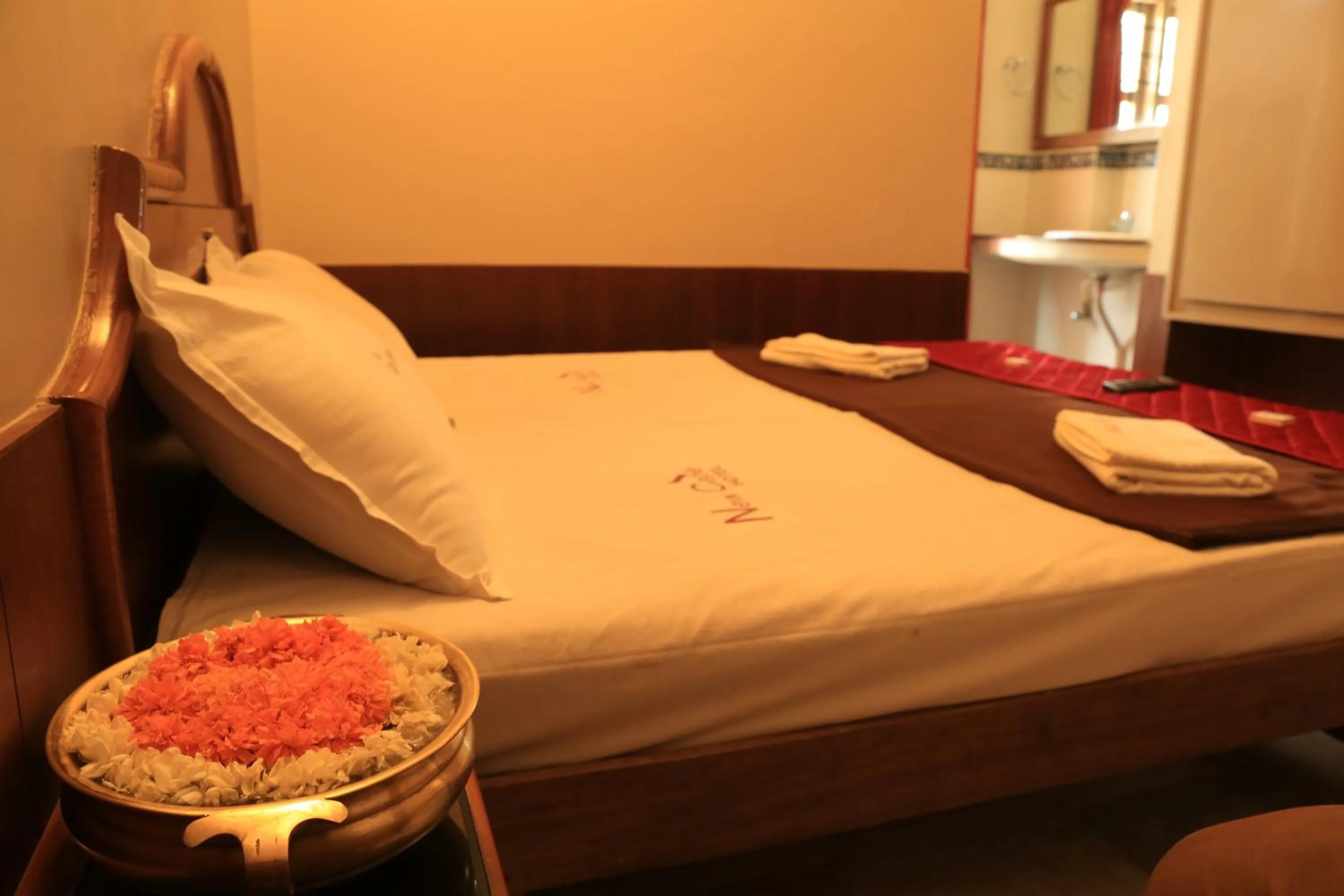 Bed in New Cape Hotel