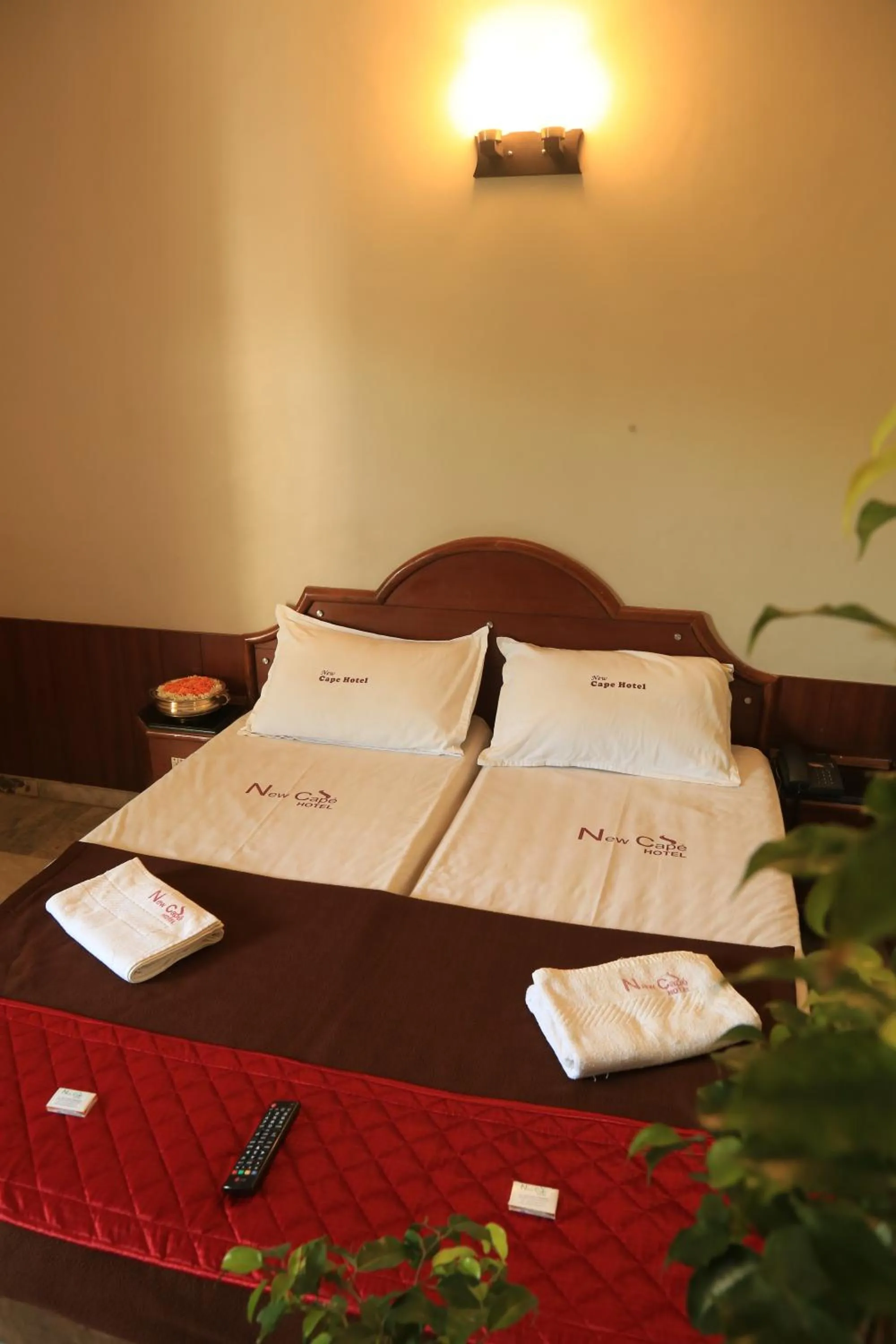 Bed in New Cape Hotel