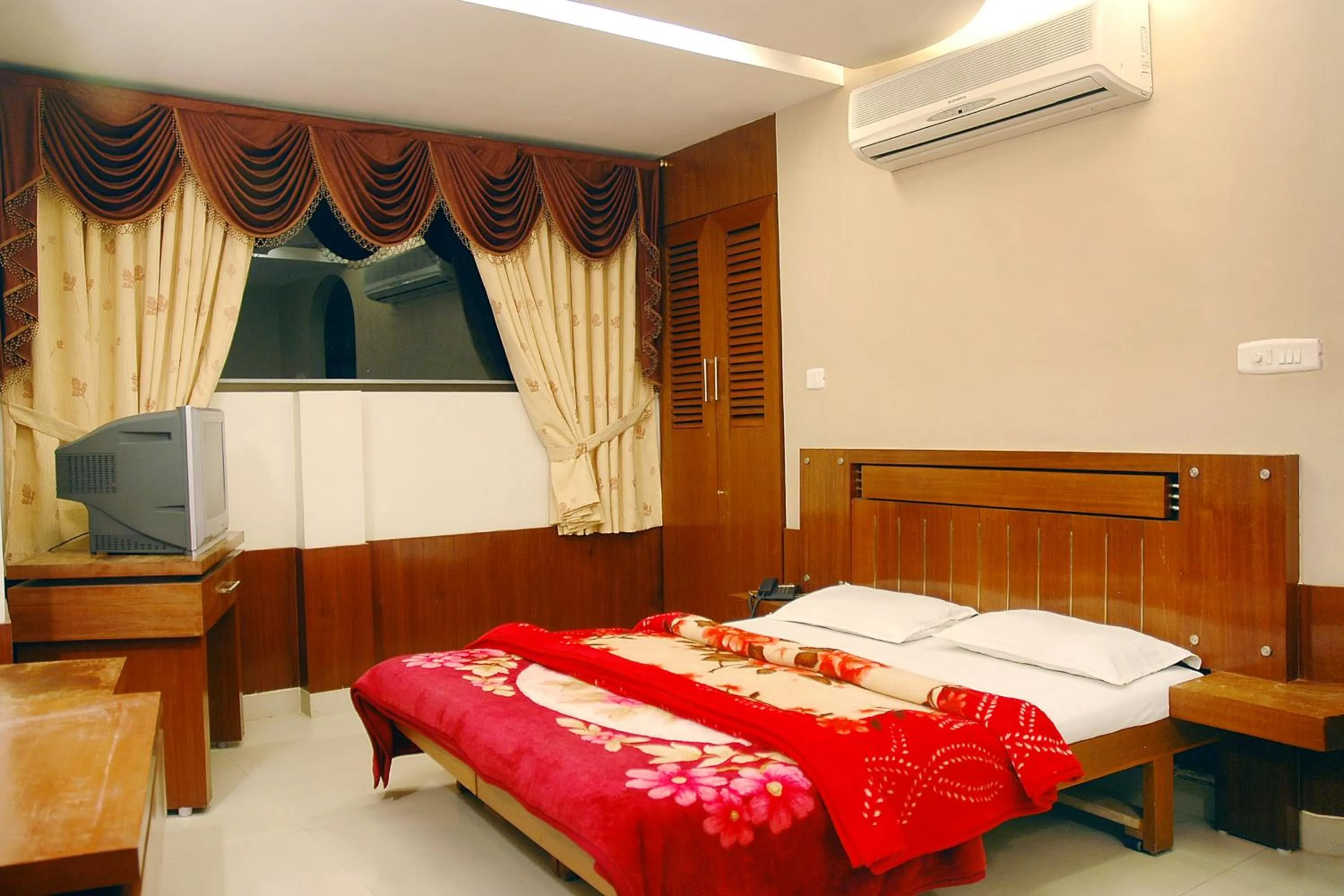 Bed in New Cape Hotel