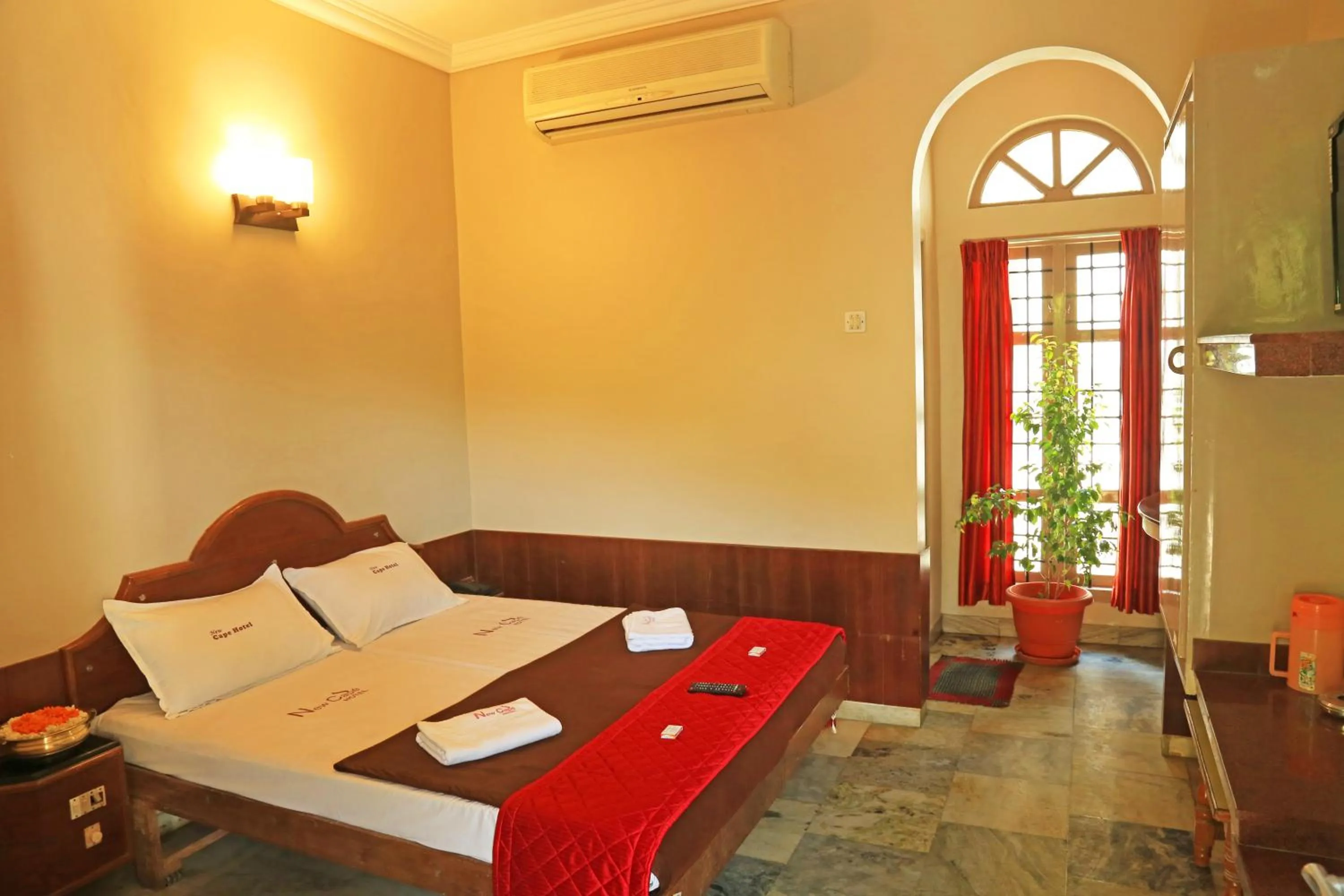 Bed in New Cape Hotel