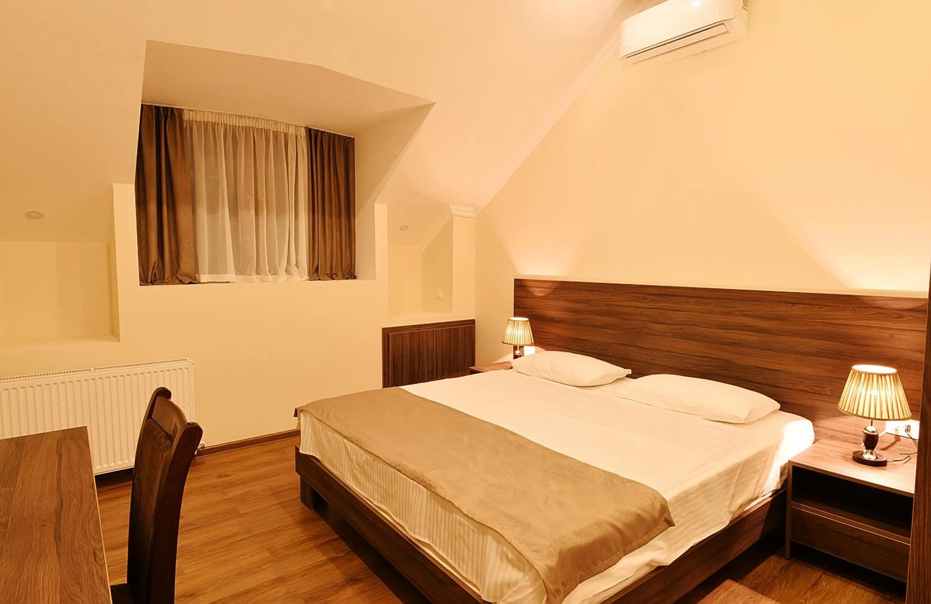 Bedroom, Bed in MGK Hotel