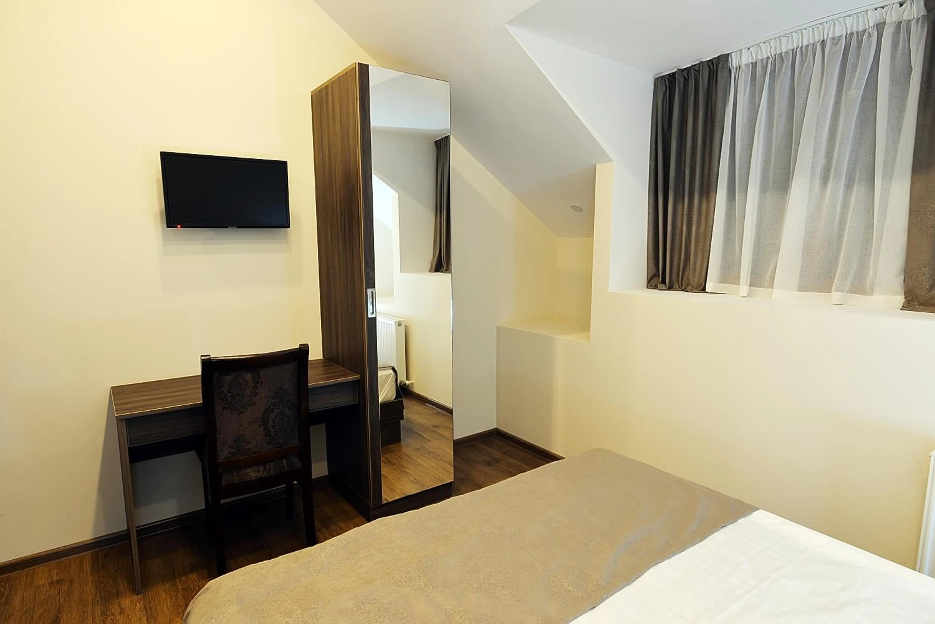 Bedroom, Bed in MGK Hotel