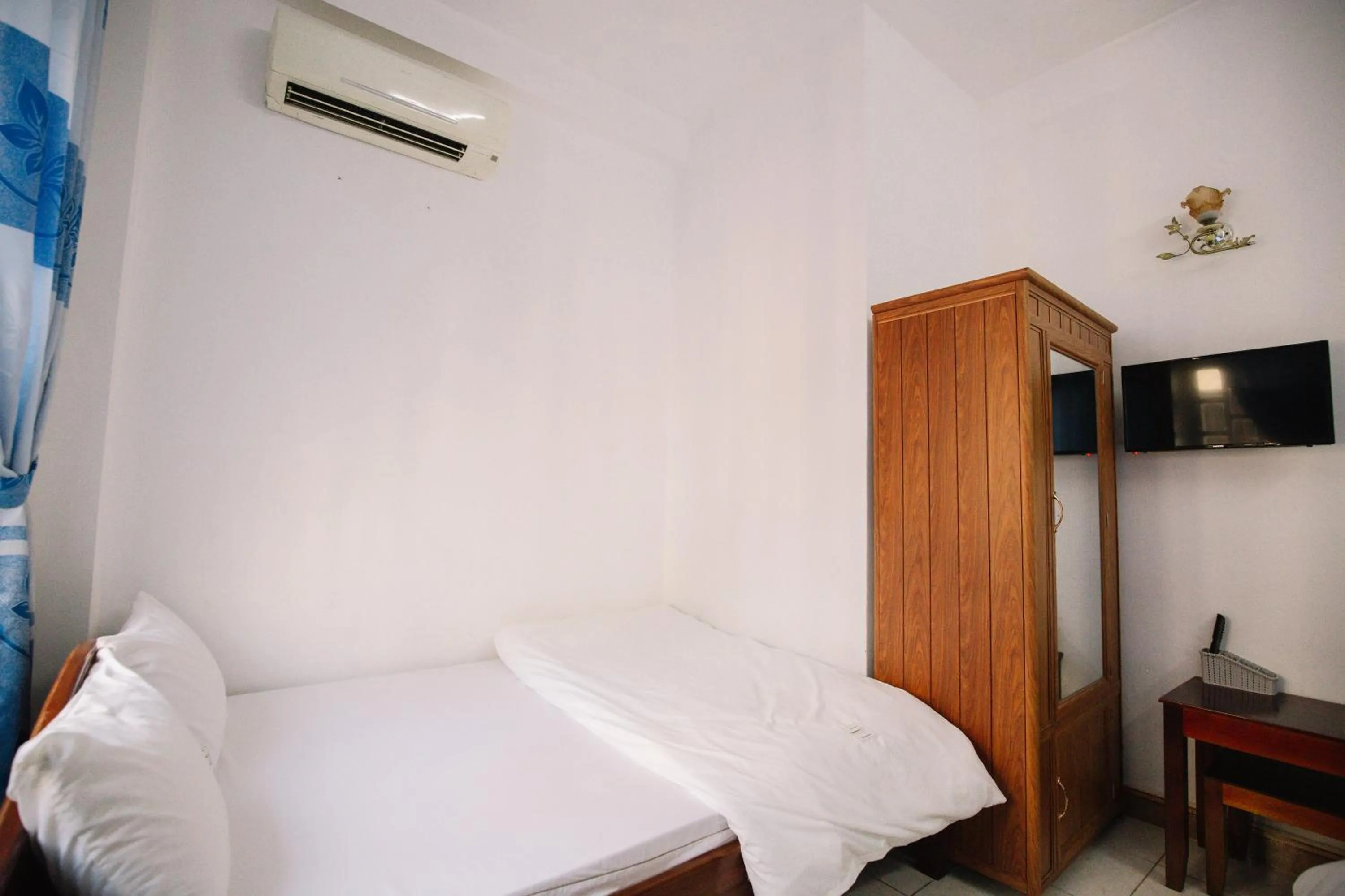 Bedroom in Lum Dong Tien Hotel