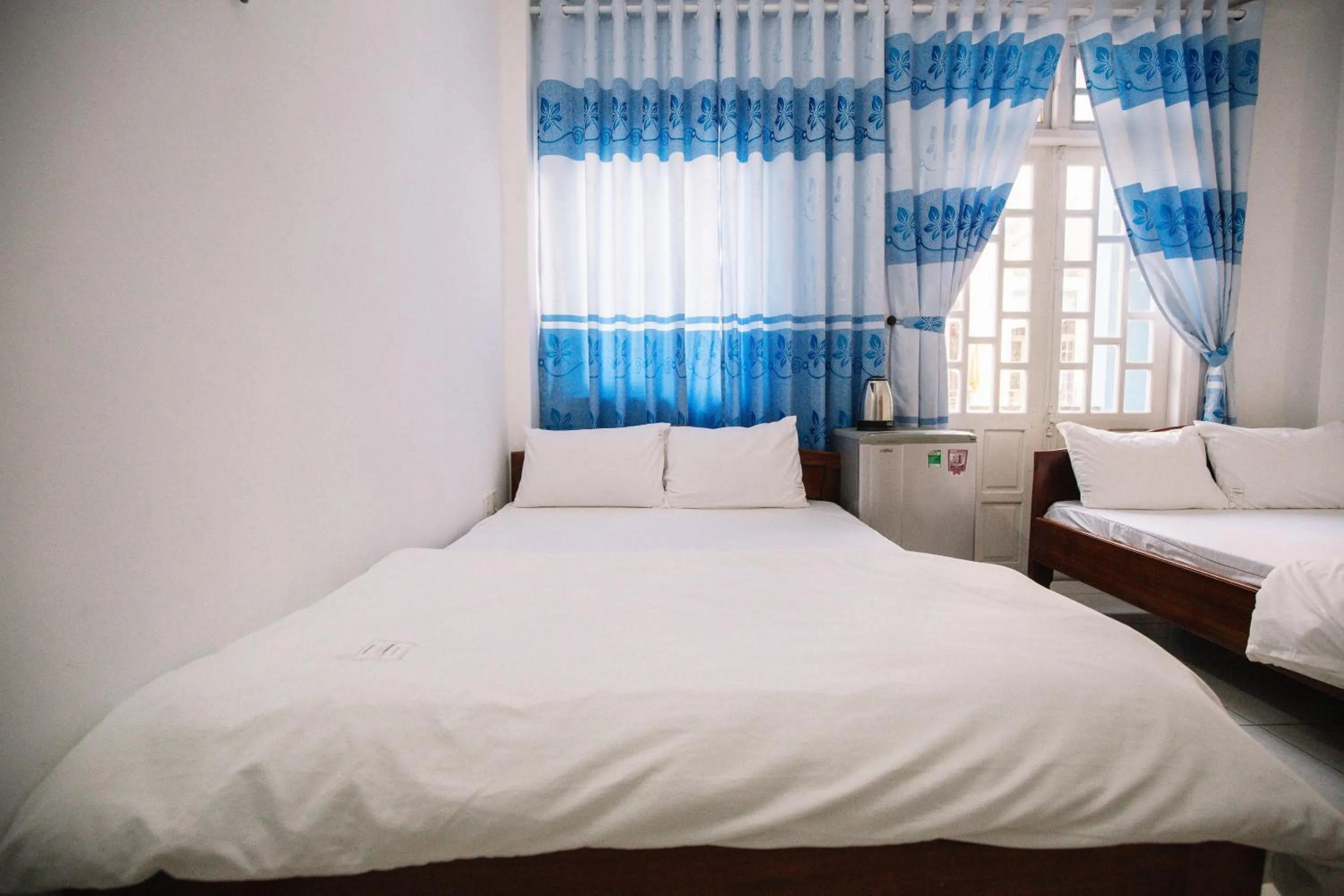 Bedroom in Lum Dong Tien Hotel