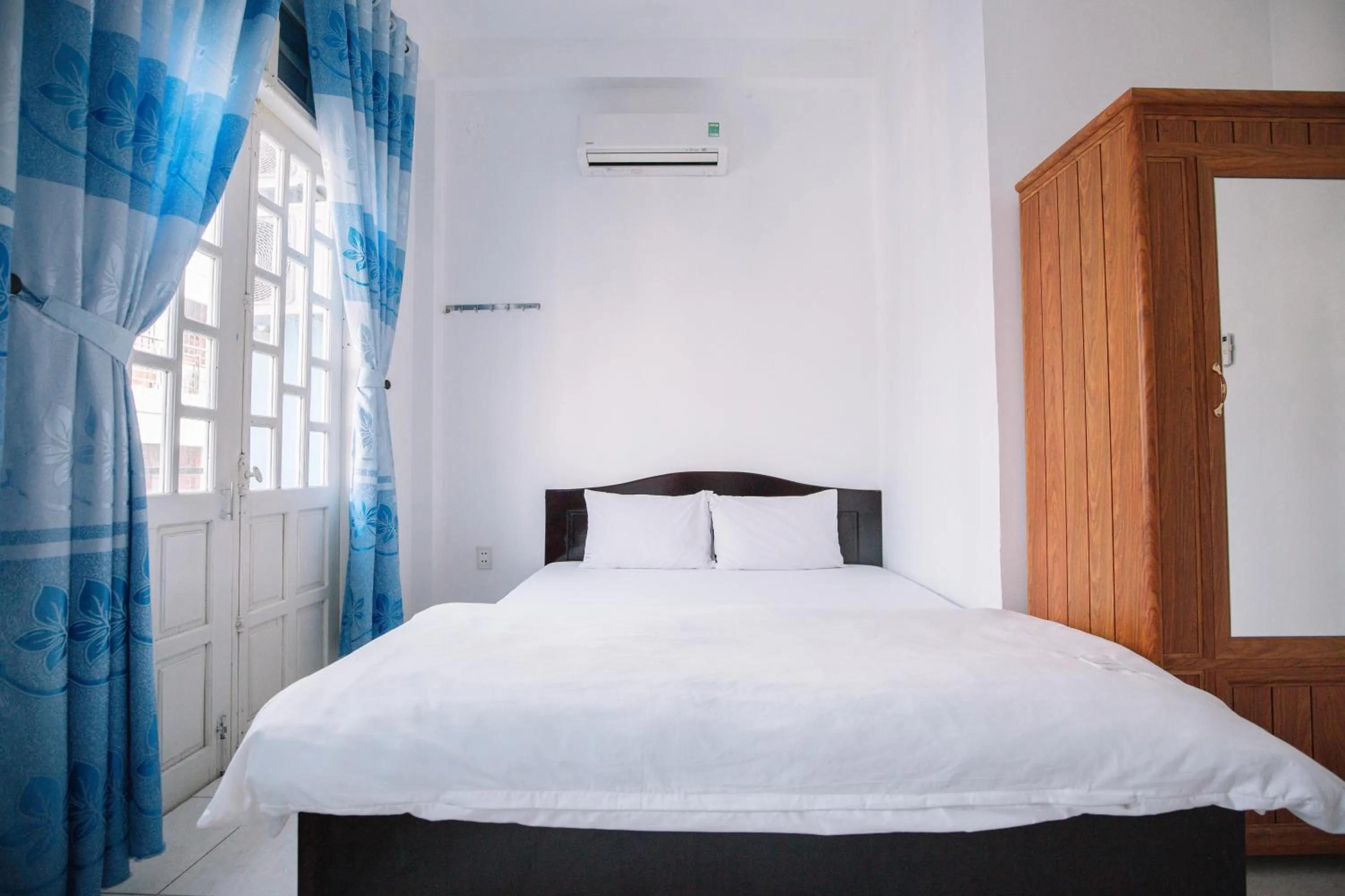 Bedroom in Lum Dong Tien Hotel