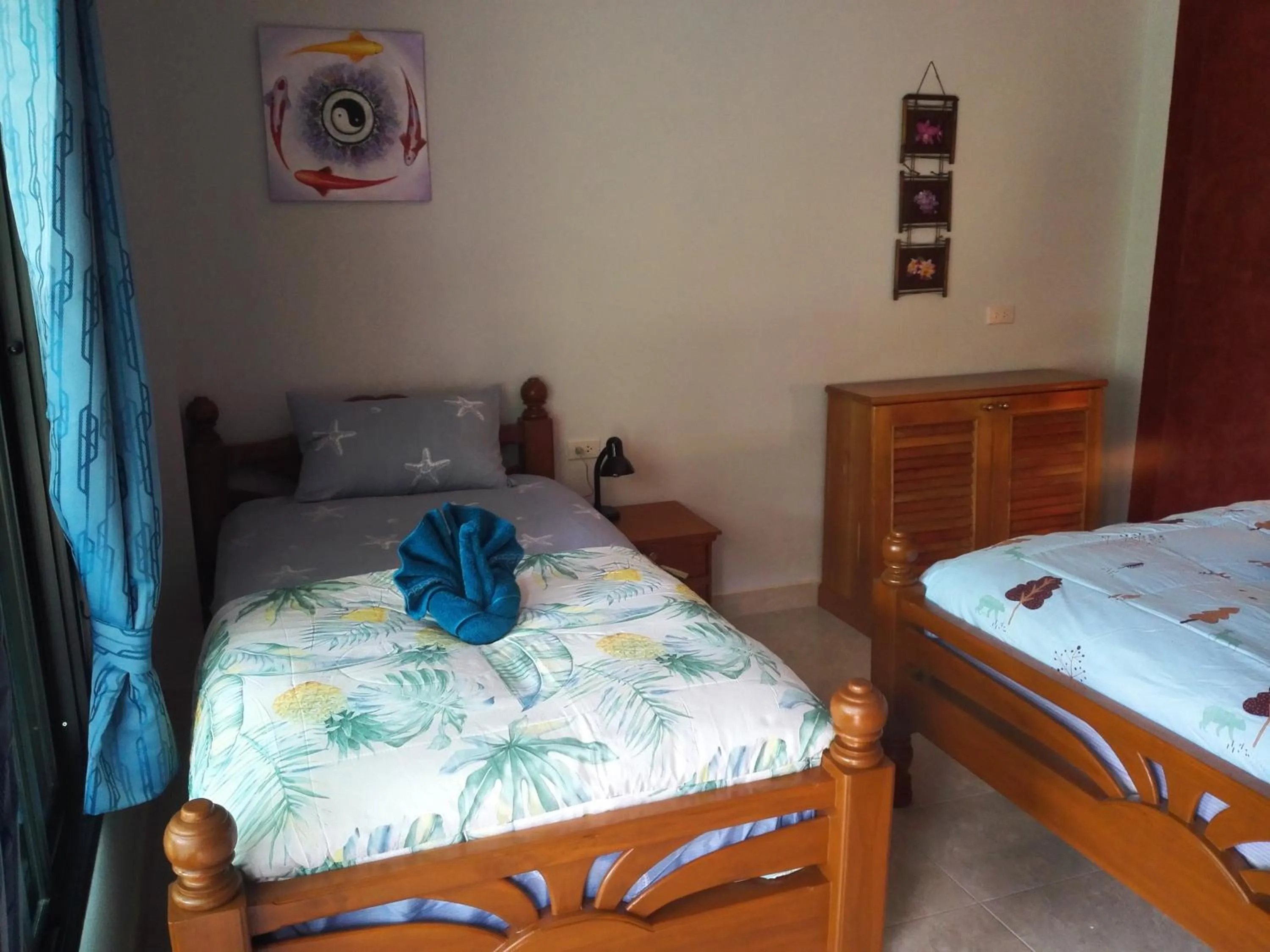 Bedroom, Bed in Nananuira Apartment and Room