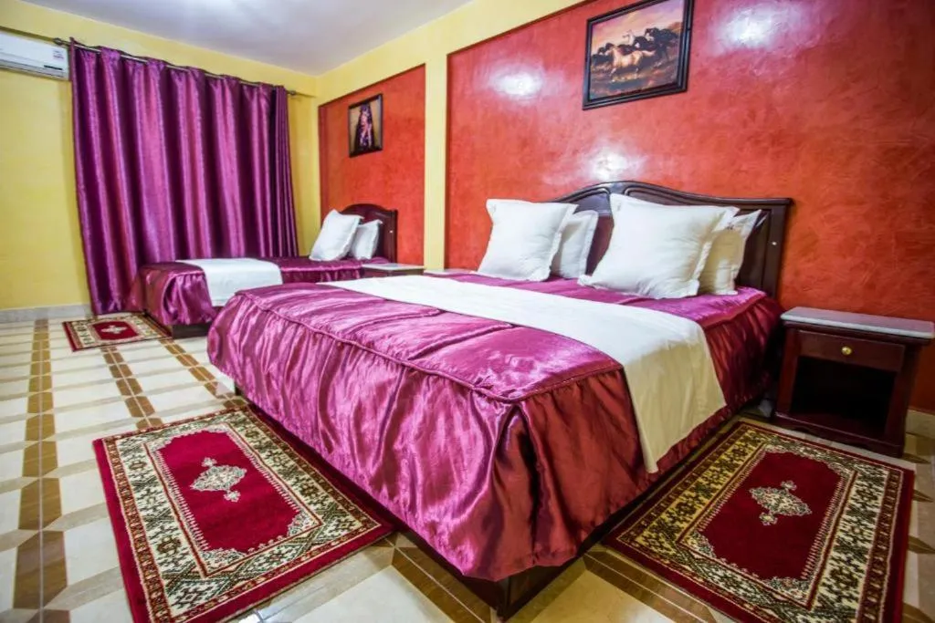 Bed in Appart Hotel Les Ambassadeurs