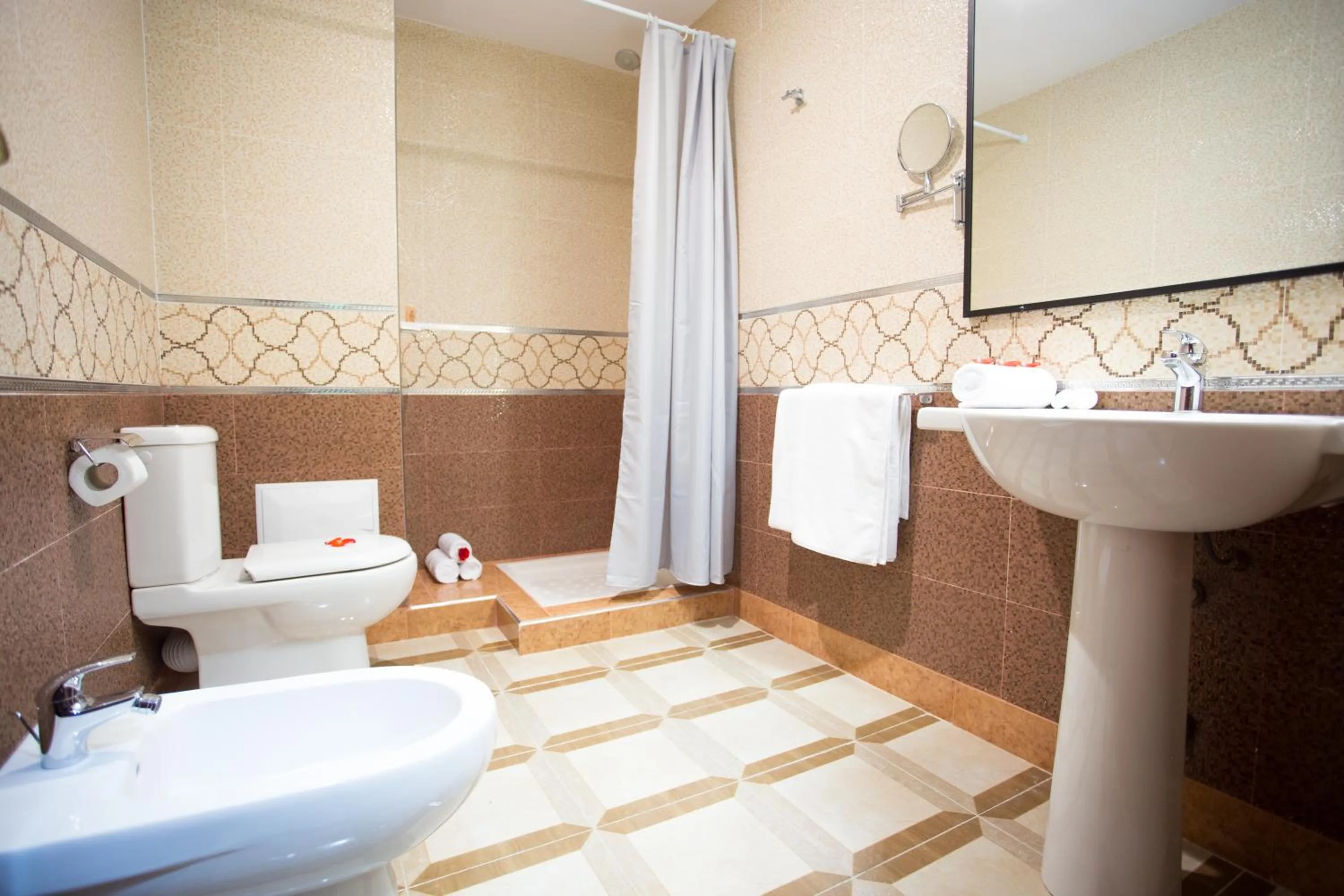 Bathroom in Appart Hotel Les Ambassadeurs