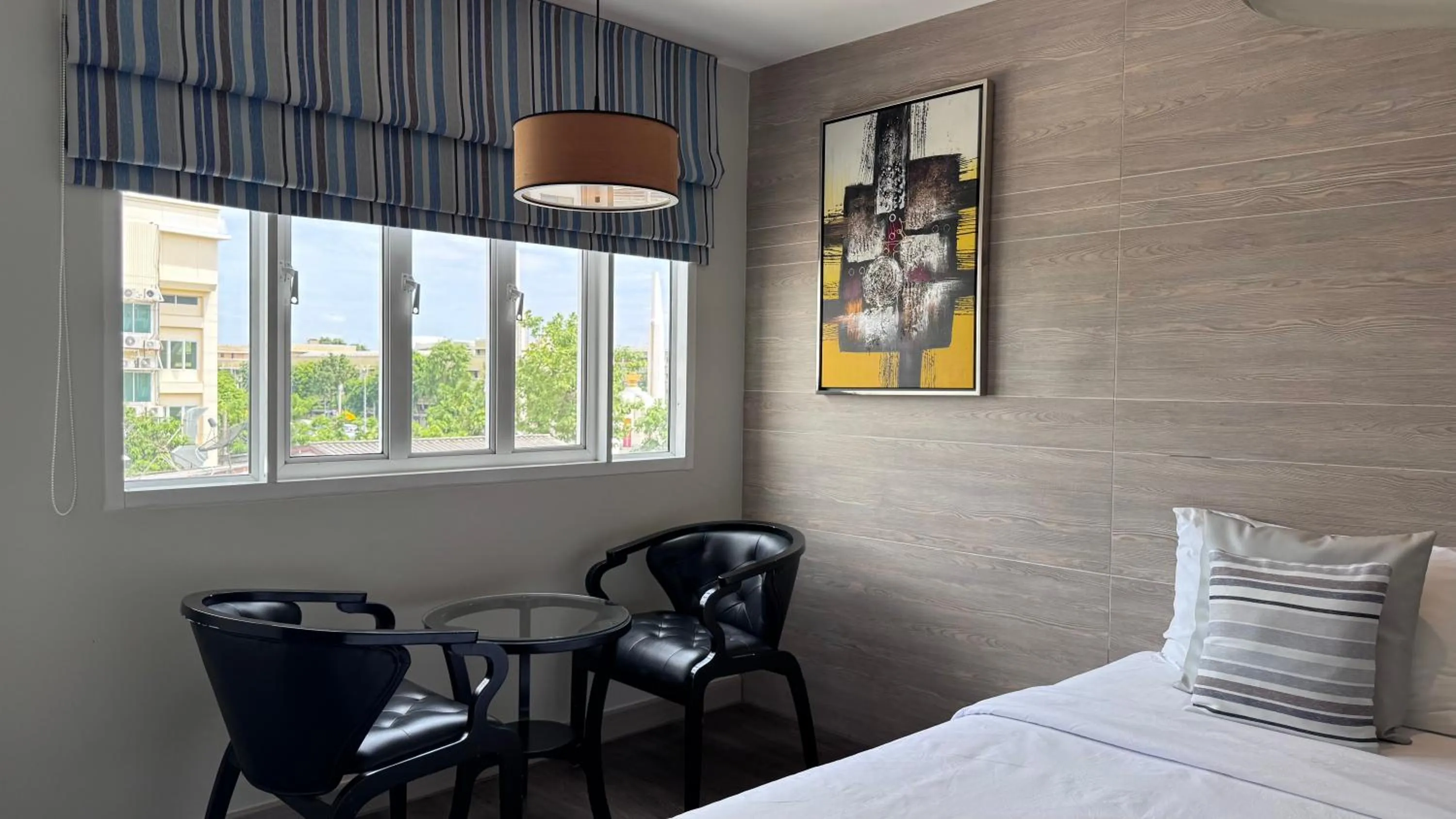 Bed in Methavalai Residence Hotel