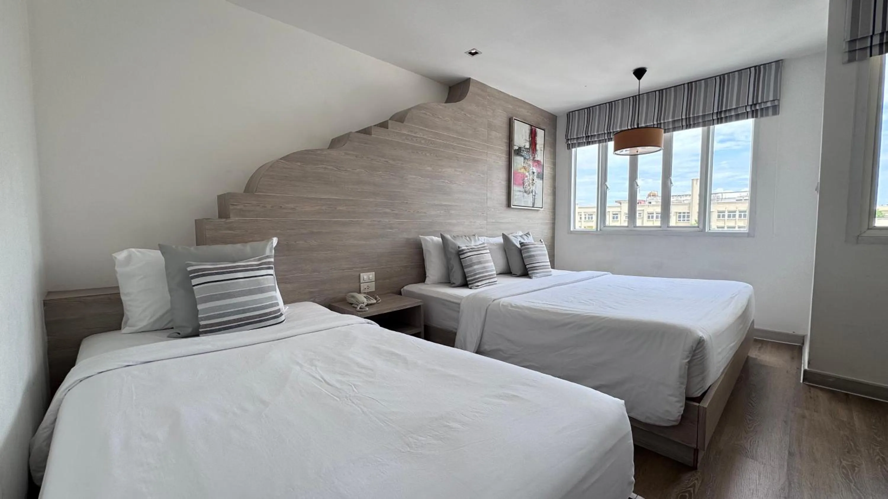 Bed in Methavalai Residence Hotel