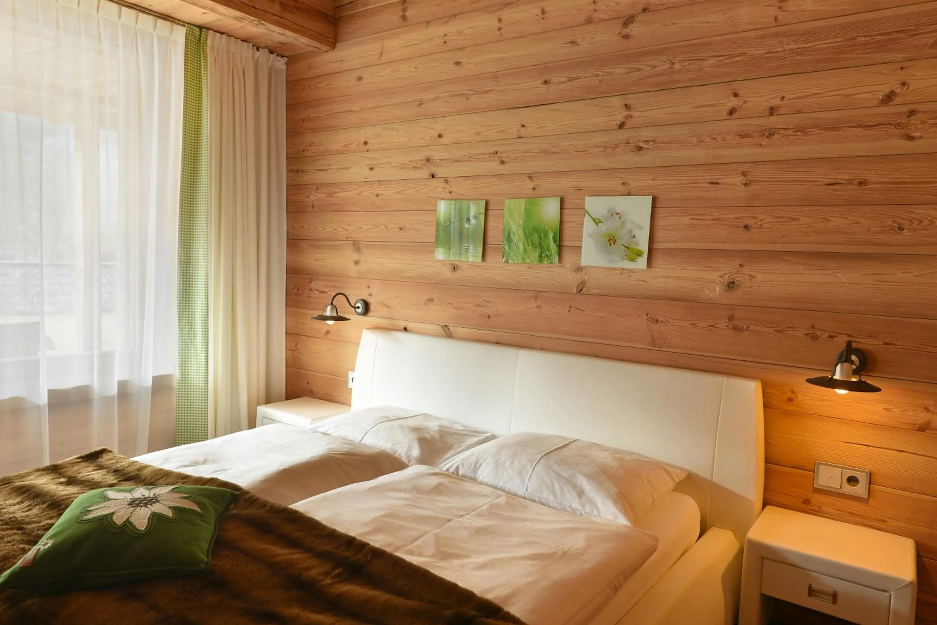 Bed in Aurina Lodges