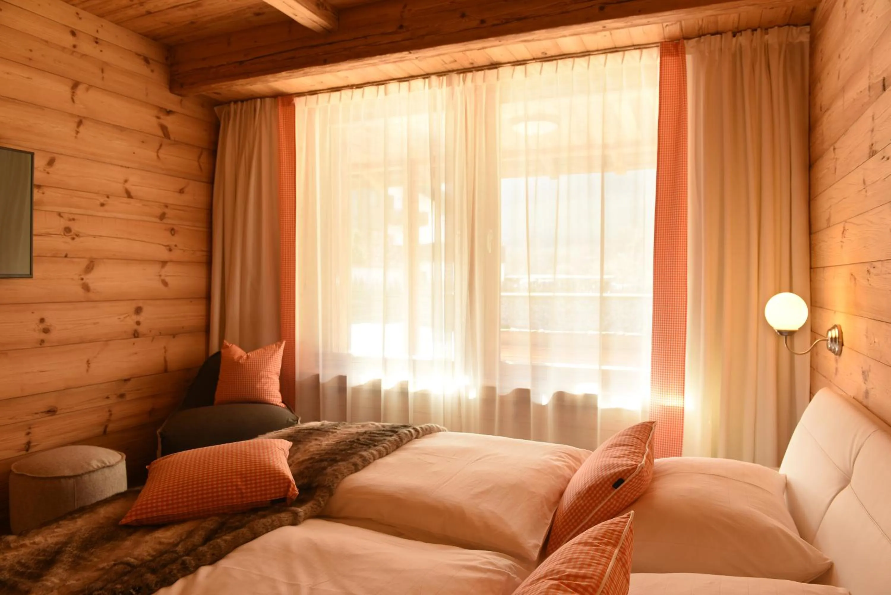 Bed in Aurina Lodges