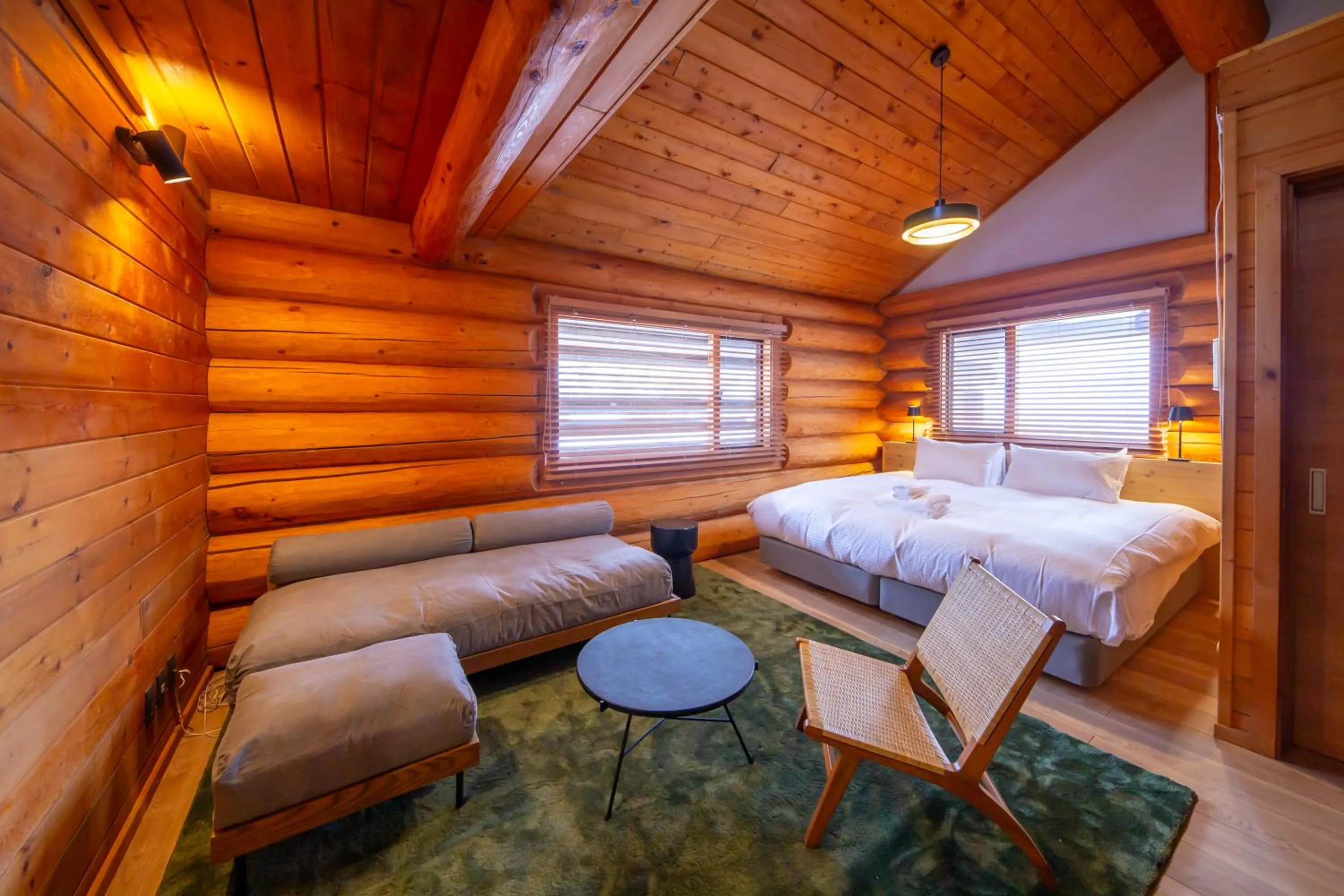 Living room, Bed in Villa Rusutsu