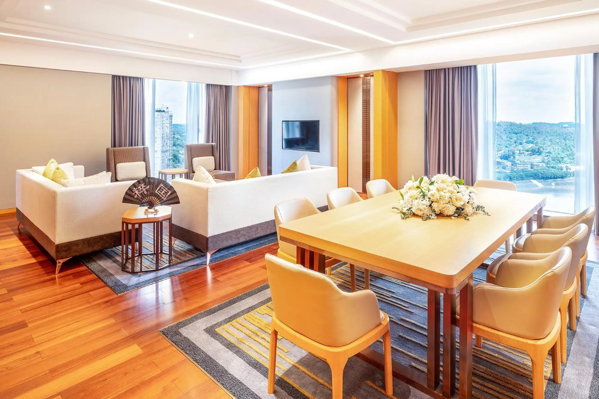 Living room in Holiday Inn Neijiang Riverside by IHG