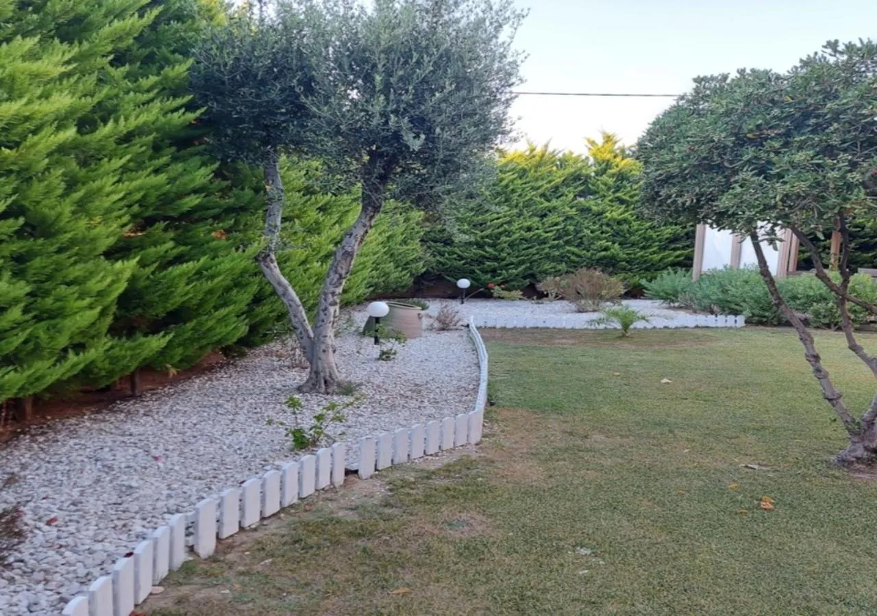 Garden in The Santo George Beach Resort