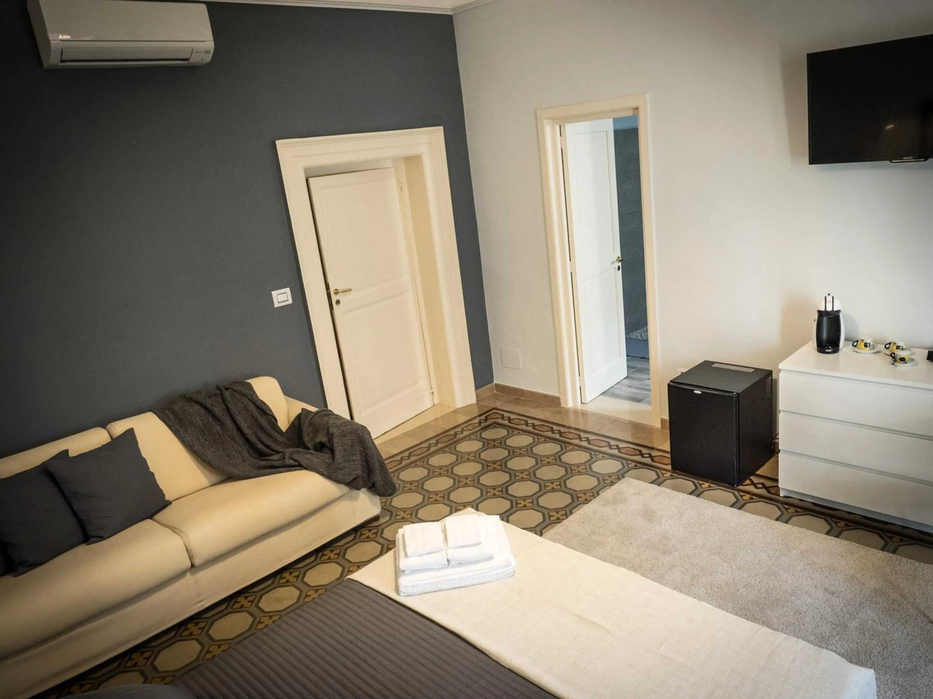 Bed in Ajde rooms & breakfast