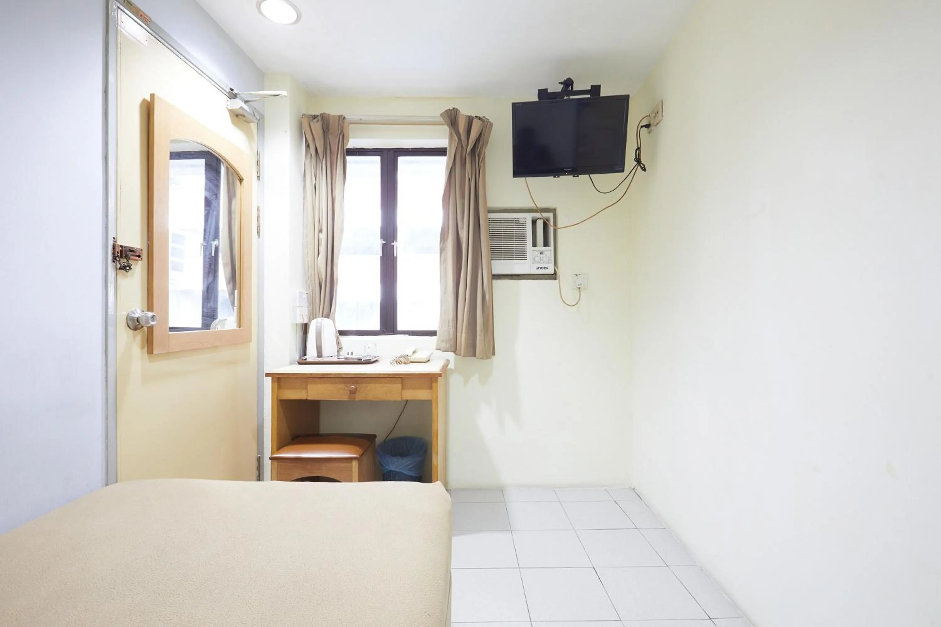 Bedroom in Tang City Hotel, Petaling Street, Merdeka PNB 118 Tower