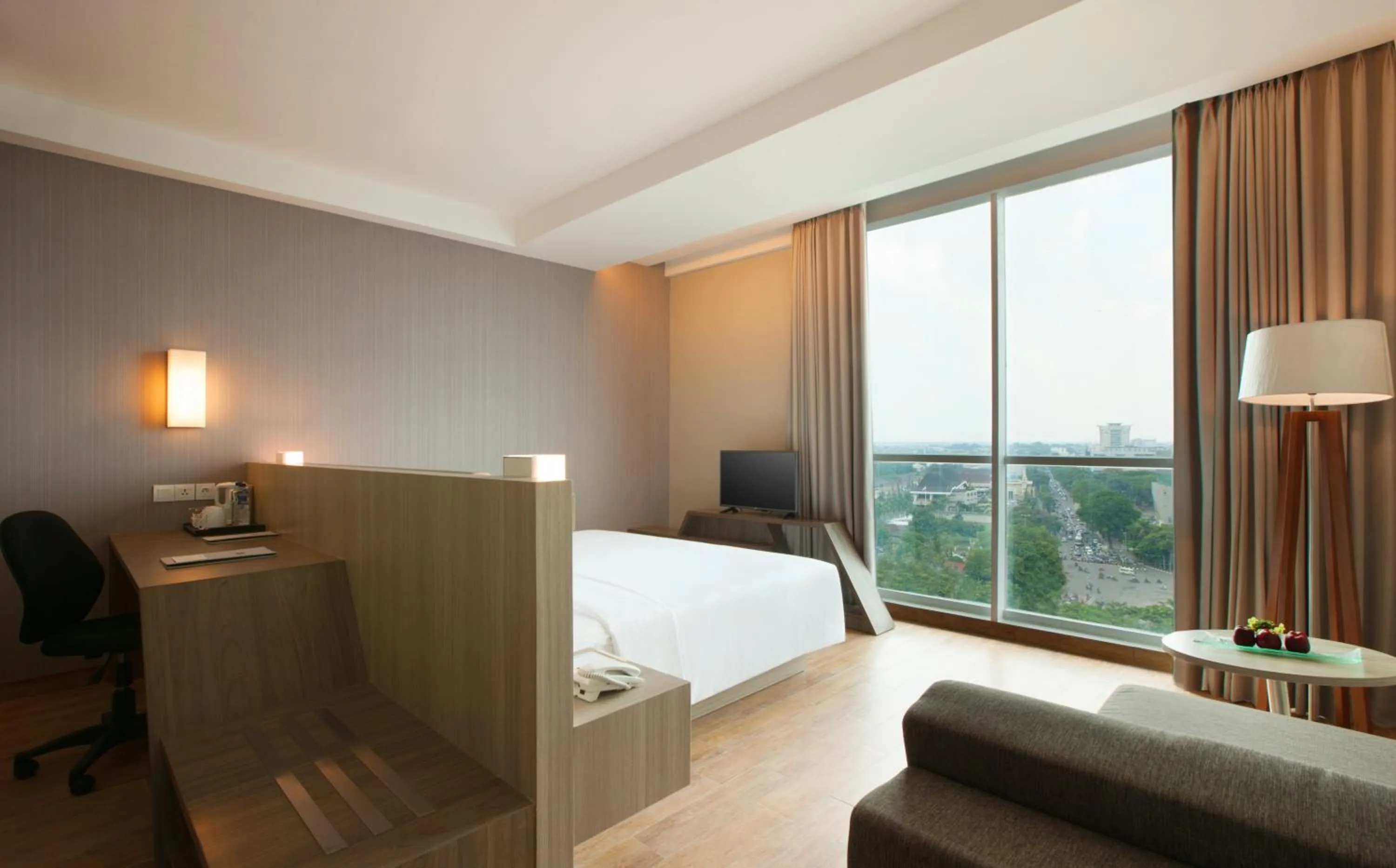 Photo of the whole room, Bed in Hotel Santika Radial Palembang