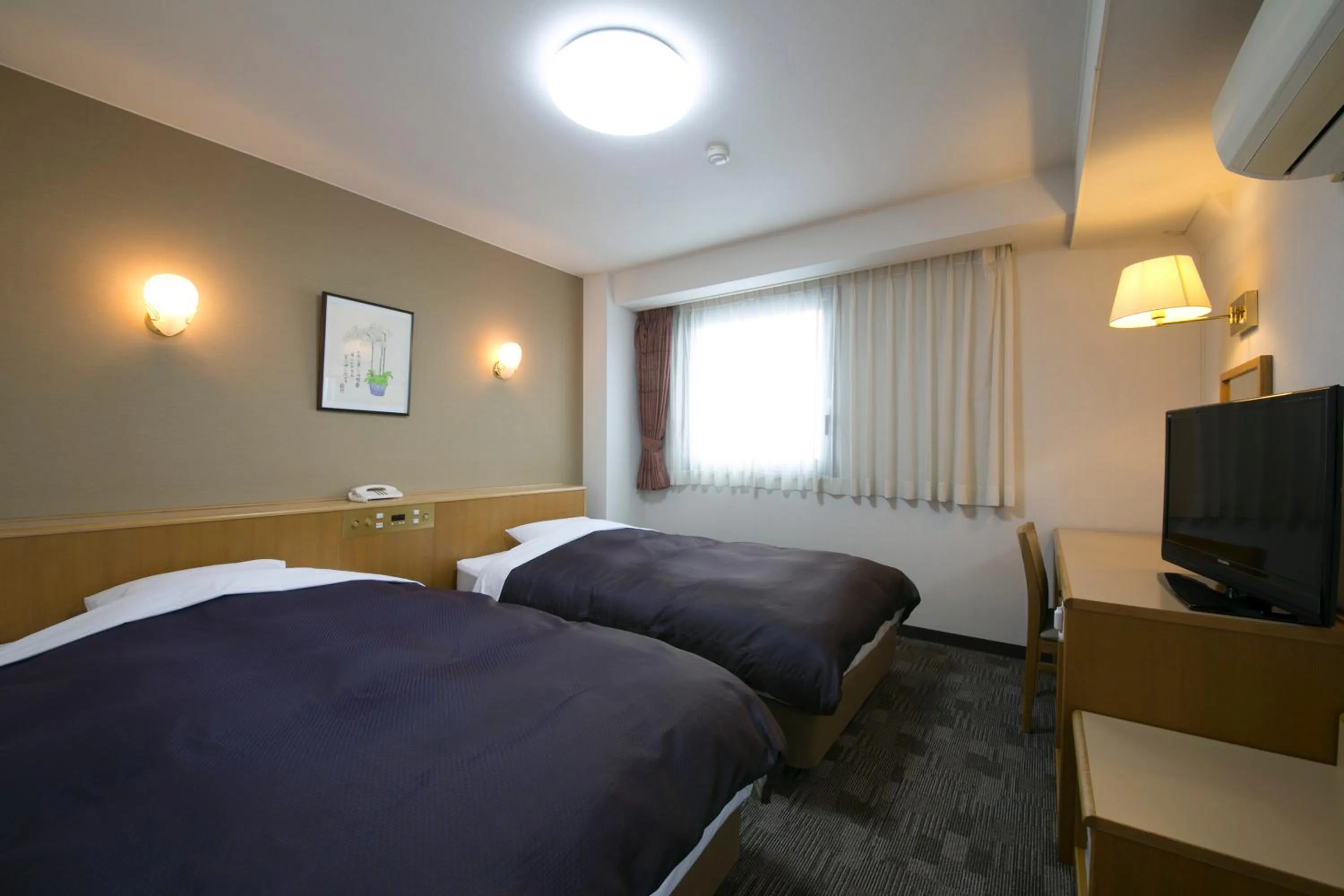 Bed in Yokaichi Royal Hotel