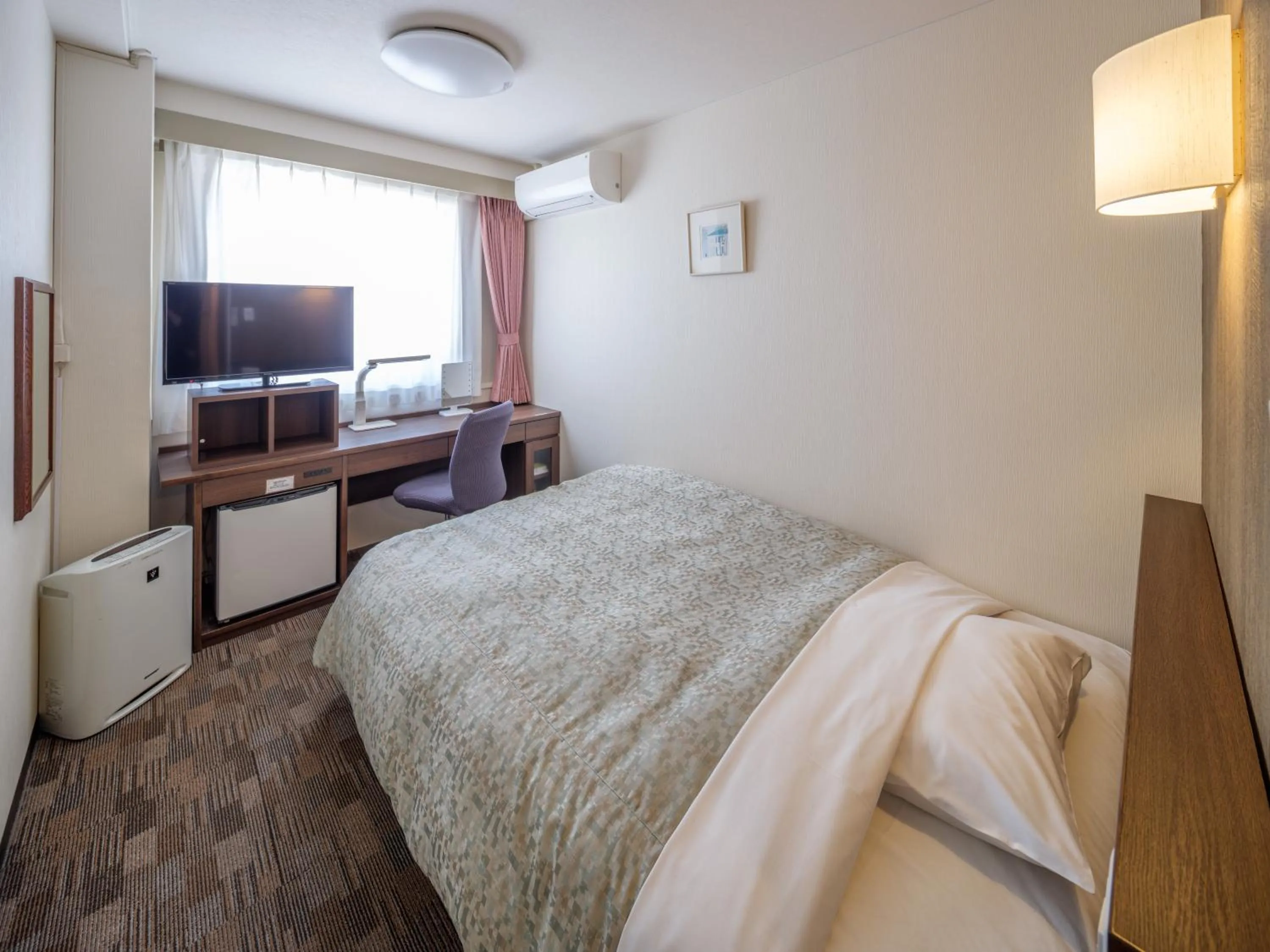 Bed in Yokaichi Royal Hotel