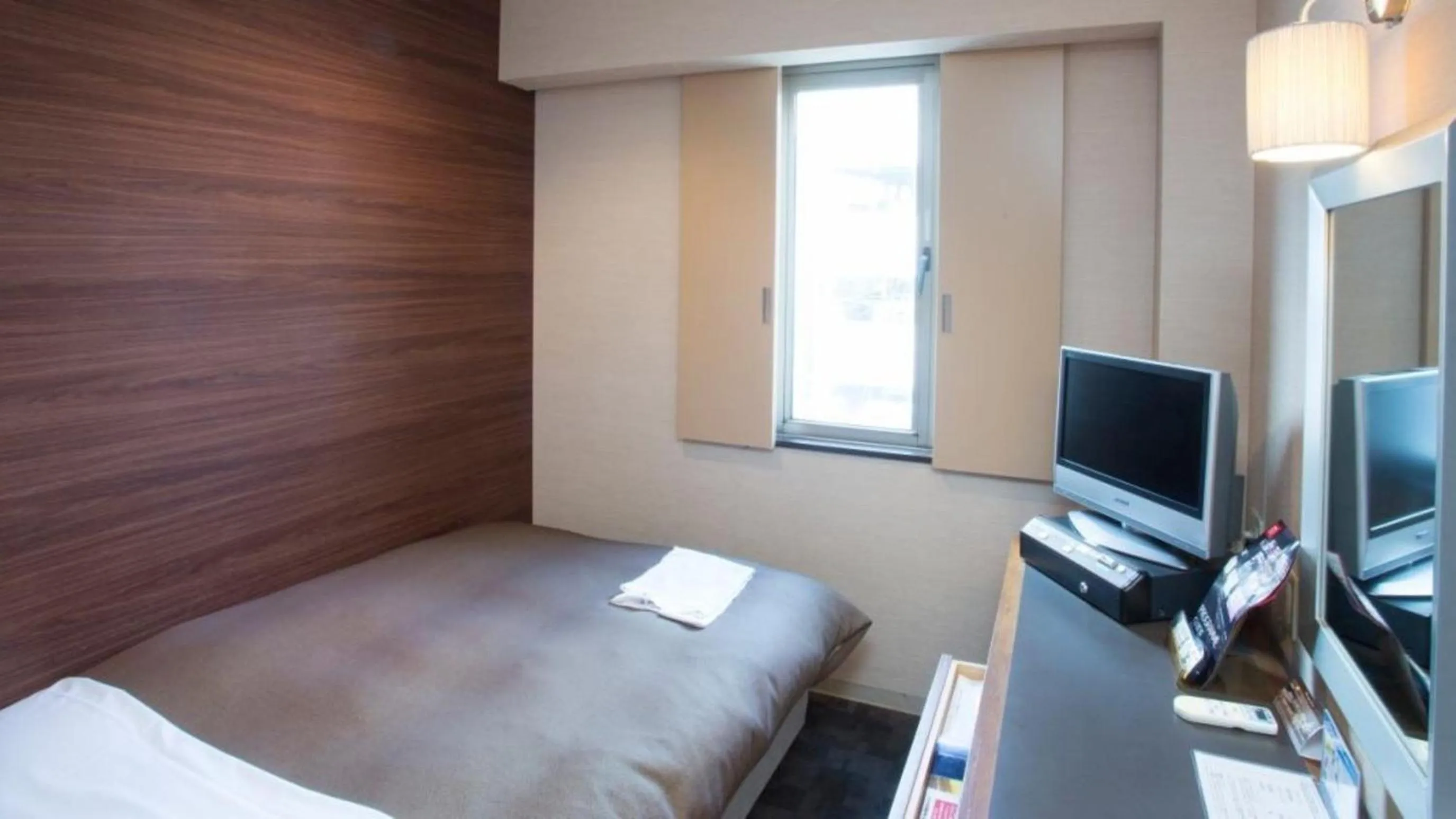 Photo of the whole room, Bed in Center Hotel Toyota