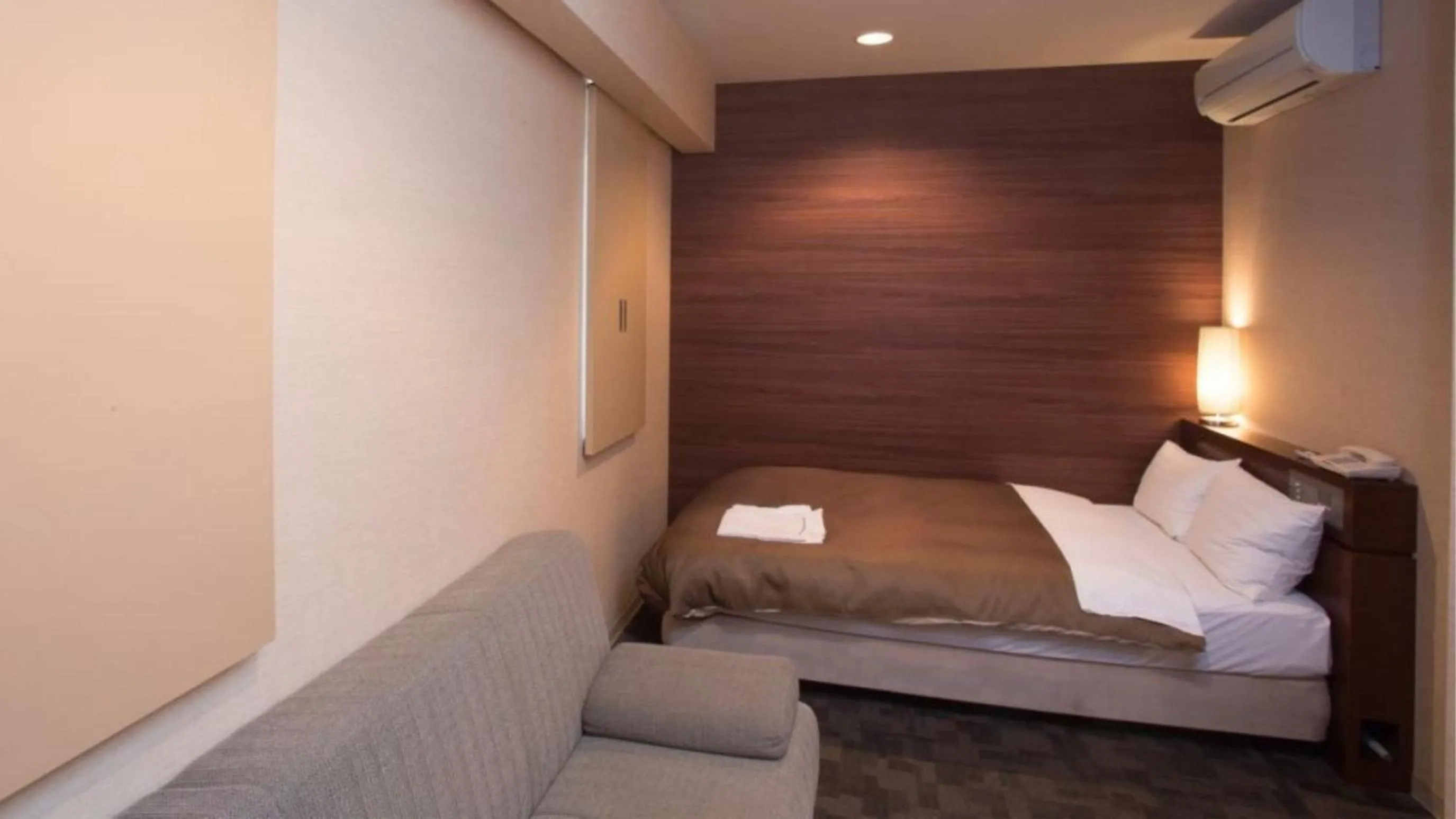 Photo of the whole room, Bed in Center Hotel Toyota