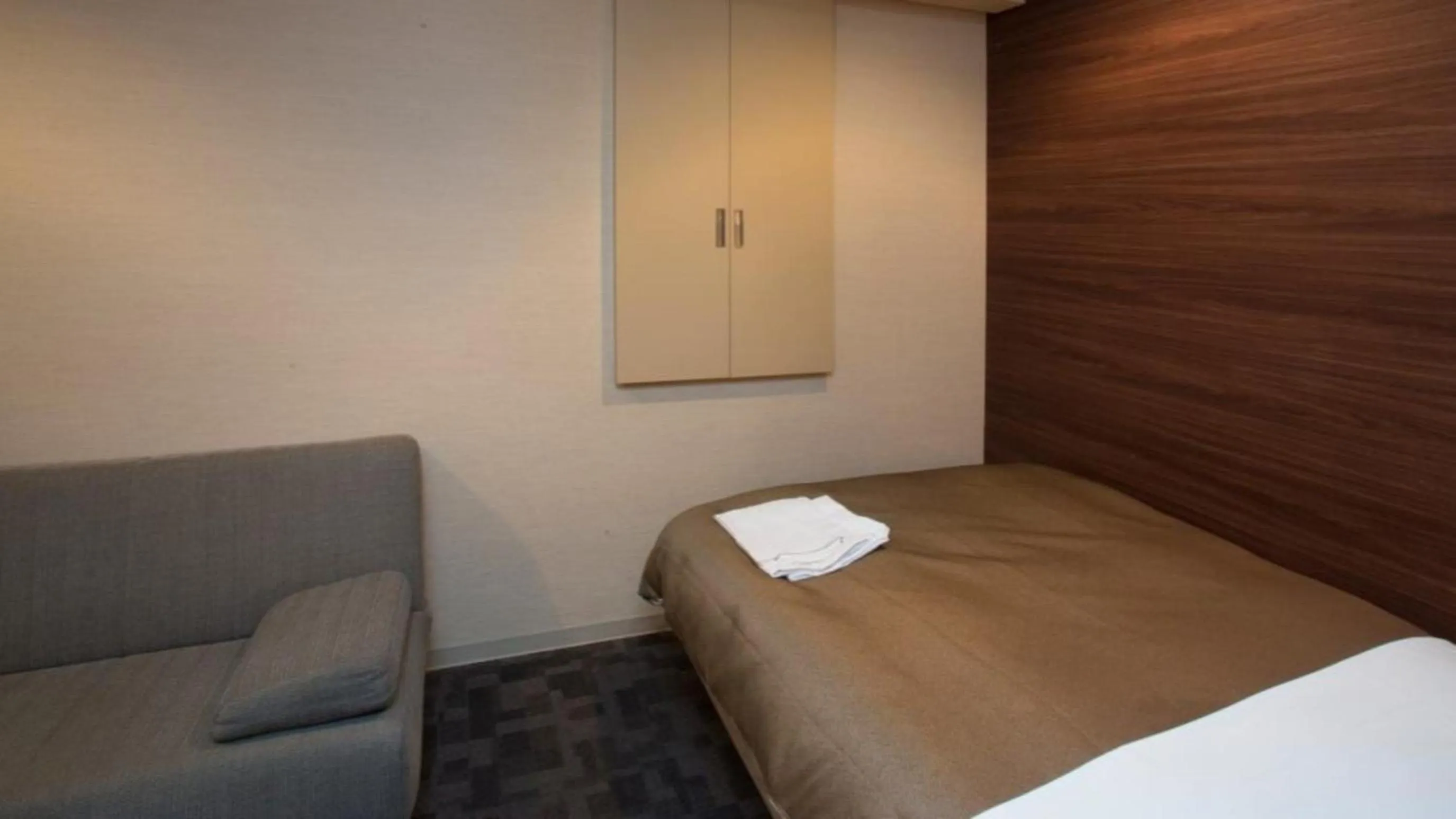 Photo of the whole room, Bed in Center Hotel Toyota