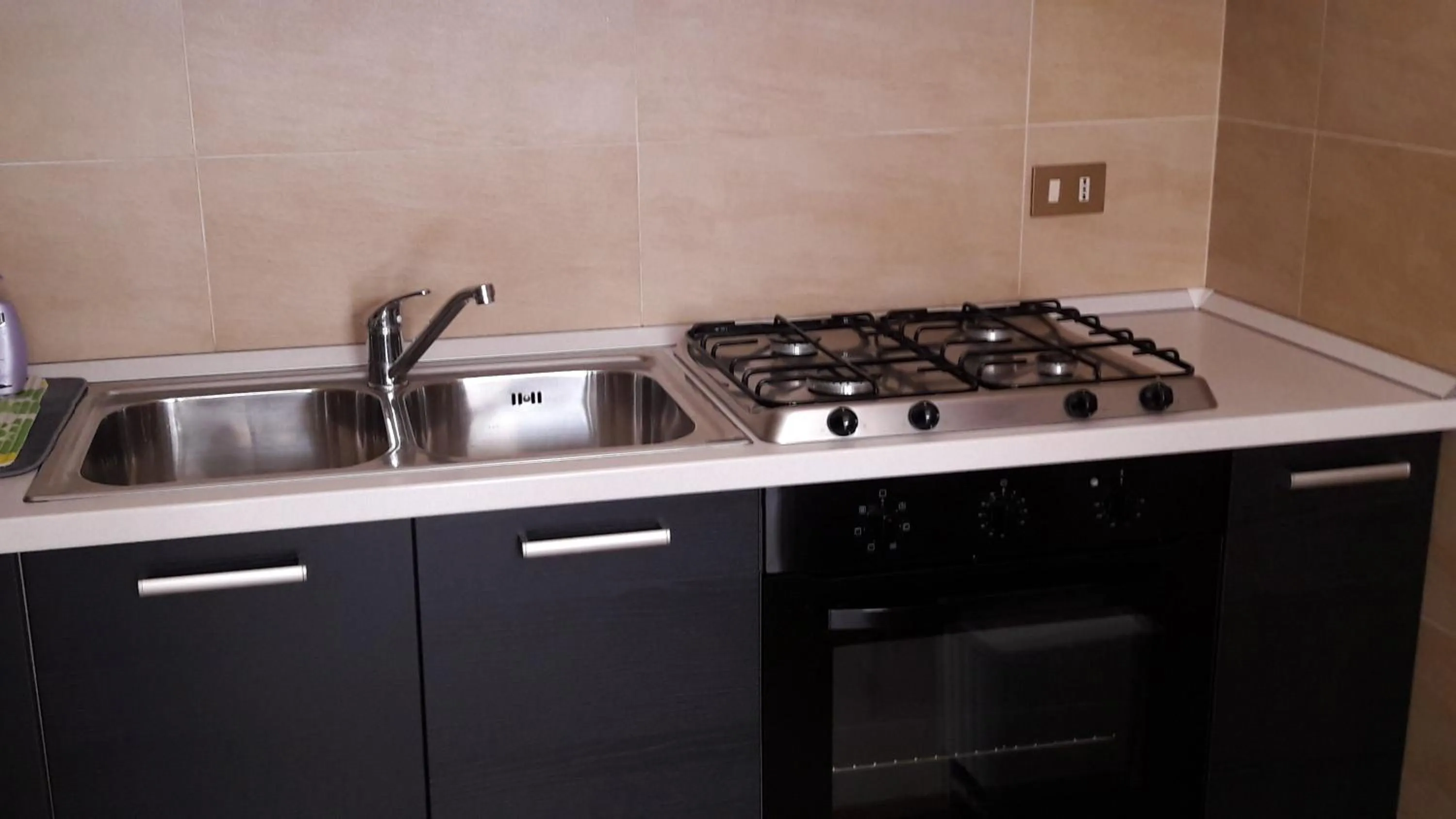 Communal kitchen in Adria Bella Locazione Turistica