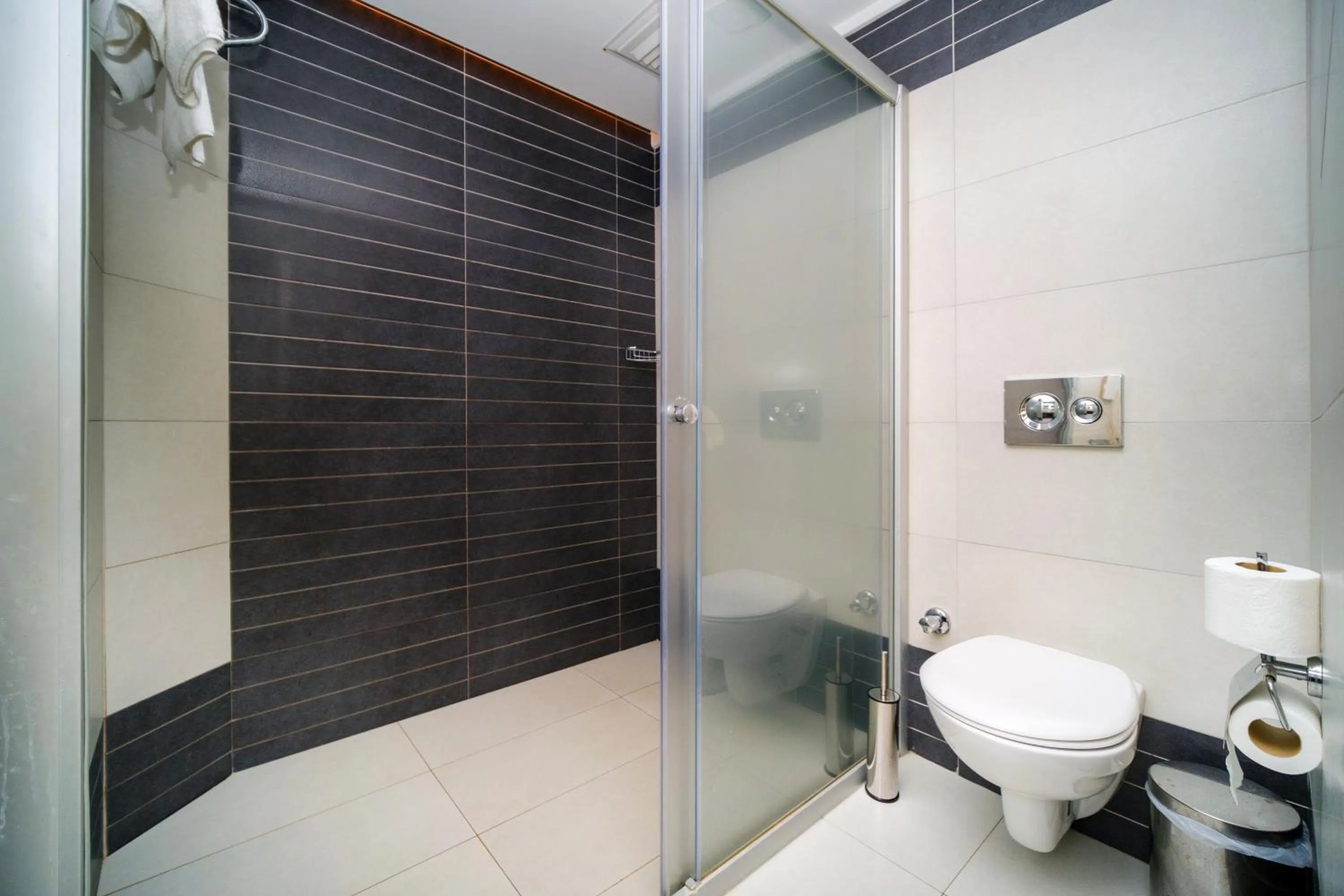 Toilet in Delfino Apart Hotel