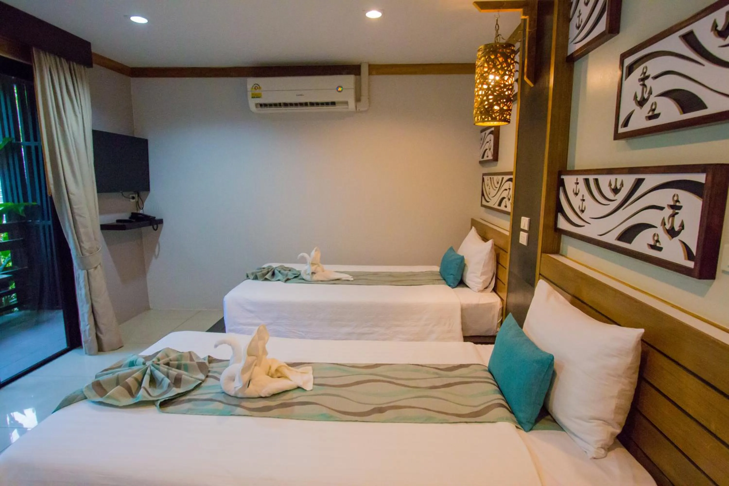 Bed in ChaoKoh Phi Phi Hotel and Resort- SHA Extra Plus