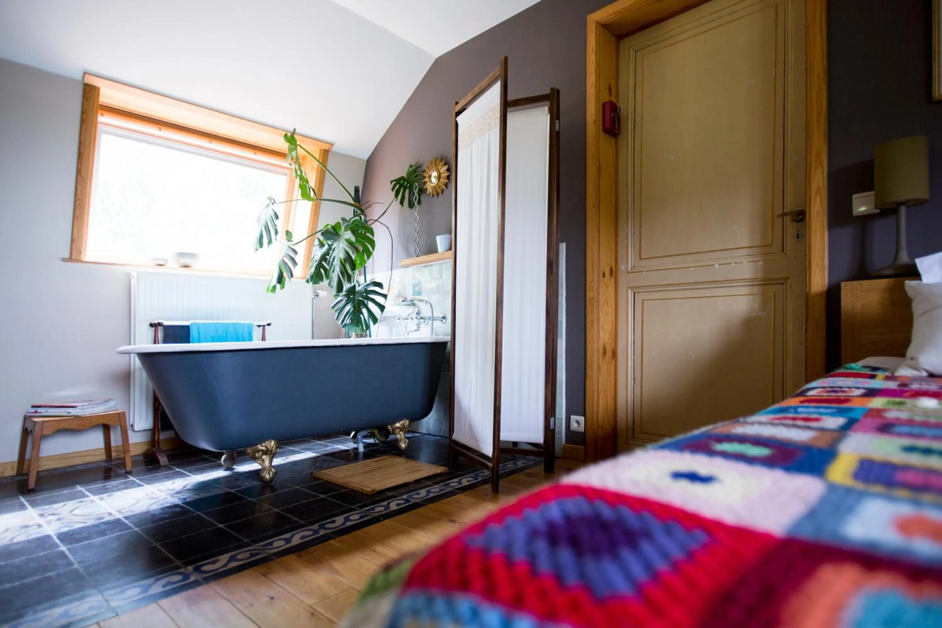 Photo of the whole room, Bed in De Weide Wereld