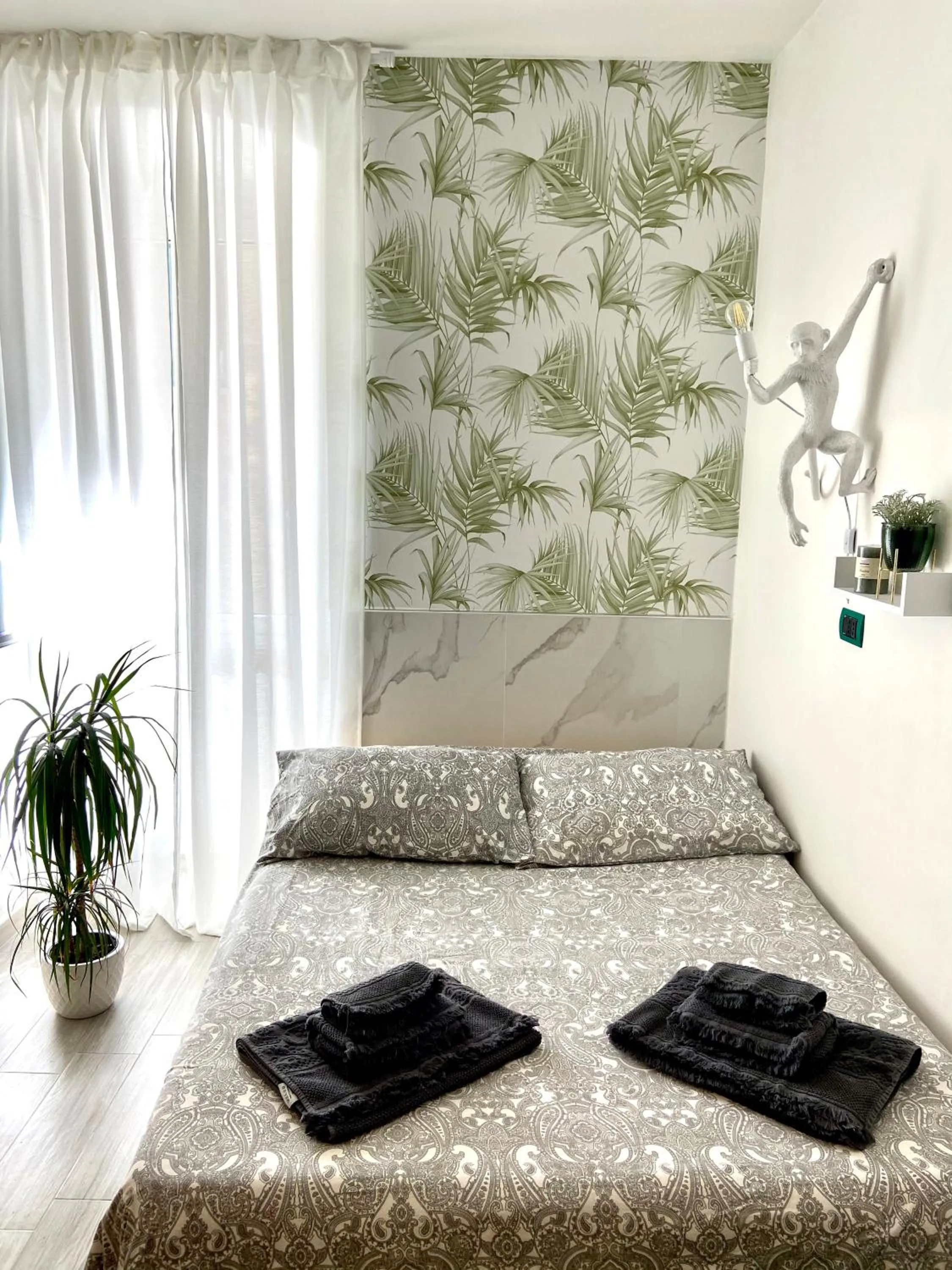 Bed in Le Statuine Dimore Diffuse