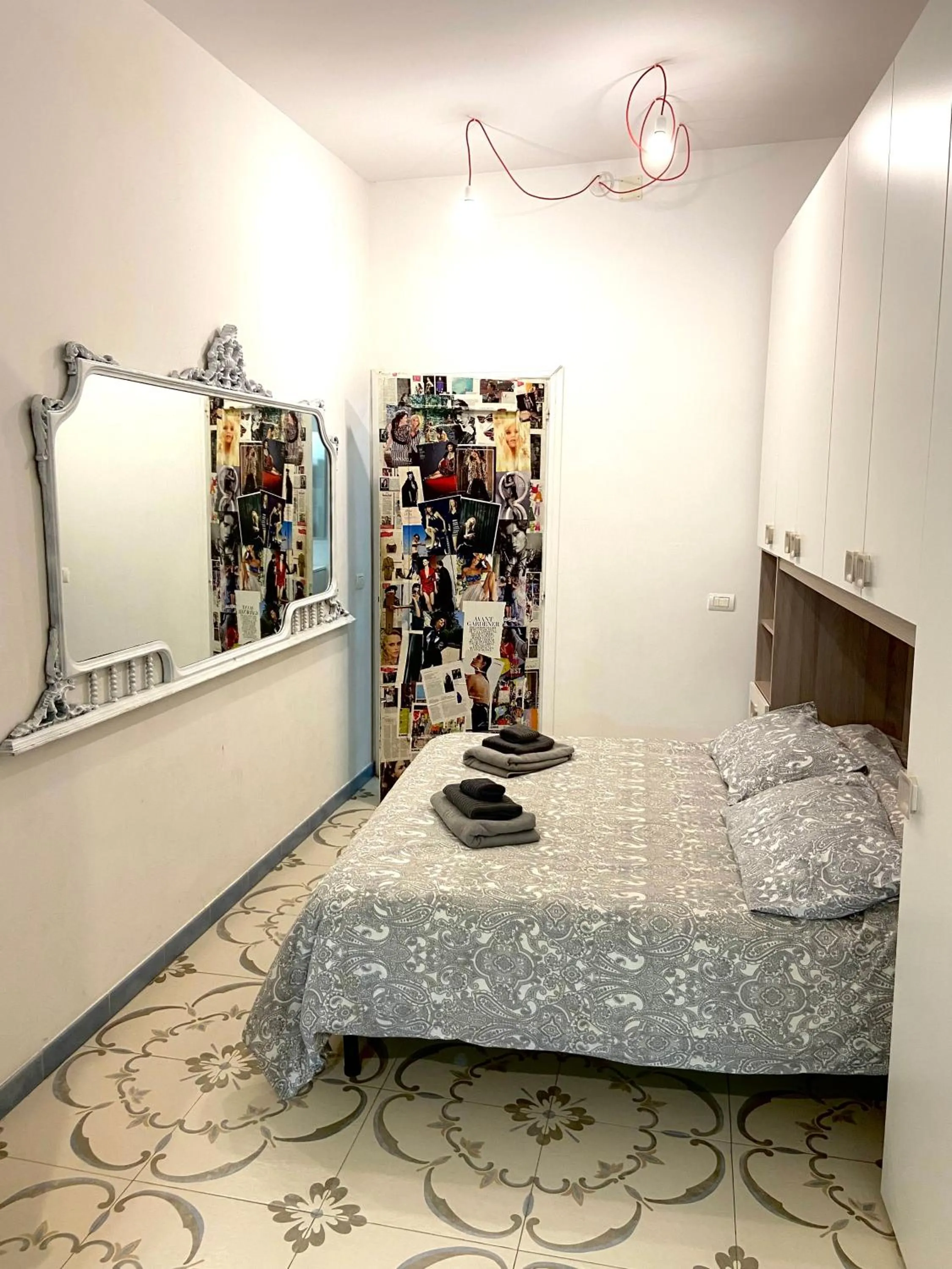 Bed in Le Statuine Dimore Diffuse