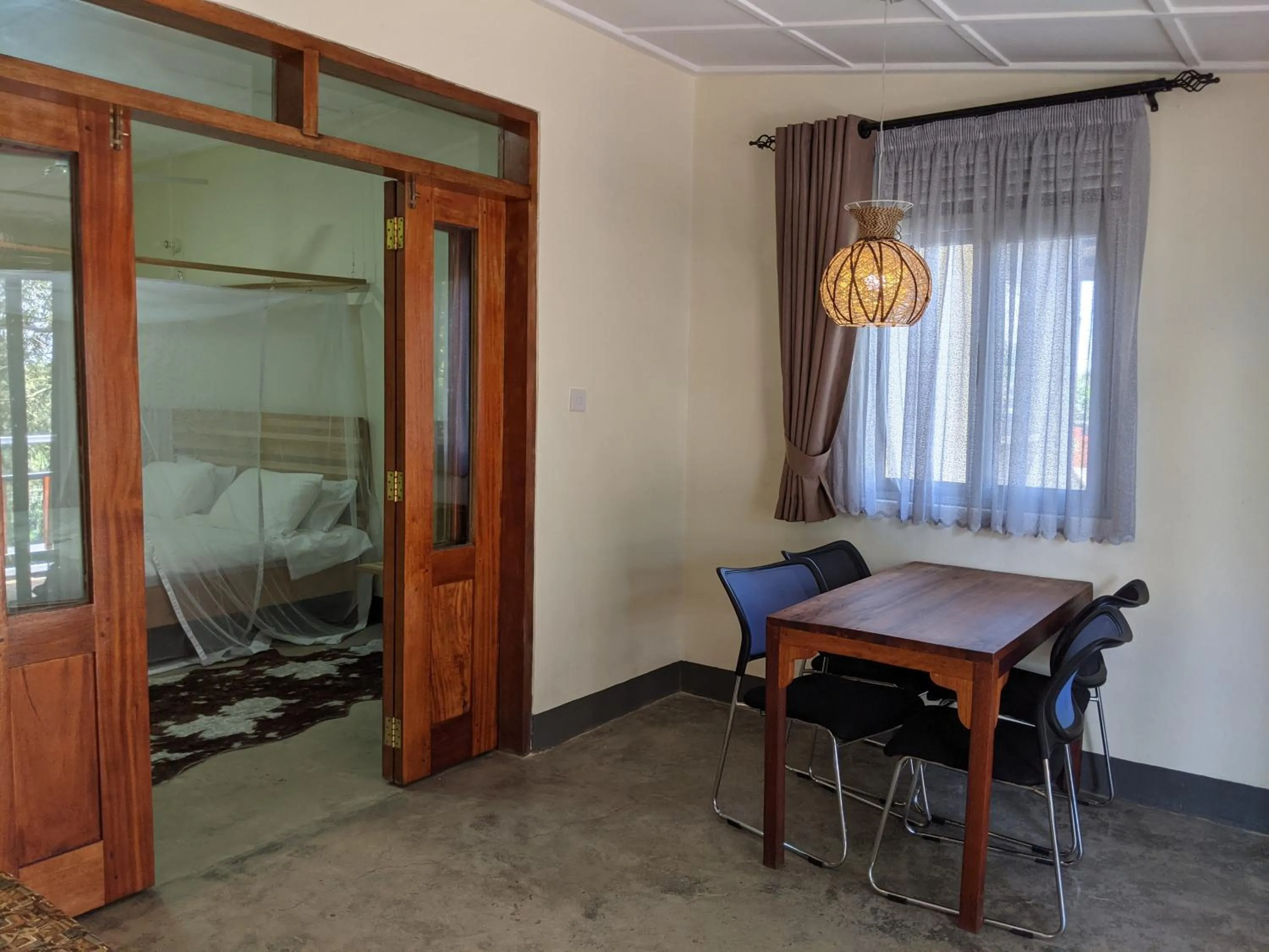 Living room, Bed in Dutchess Hotel and Restaurant