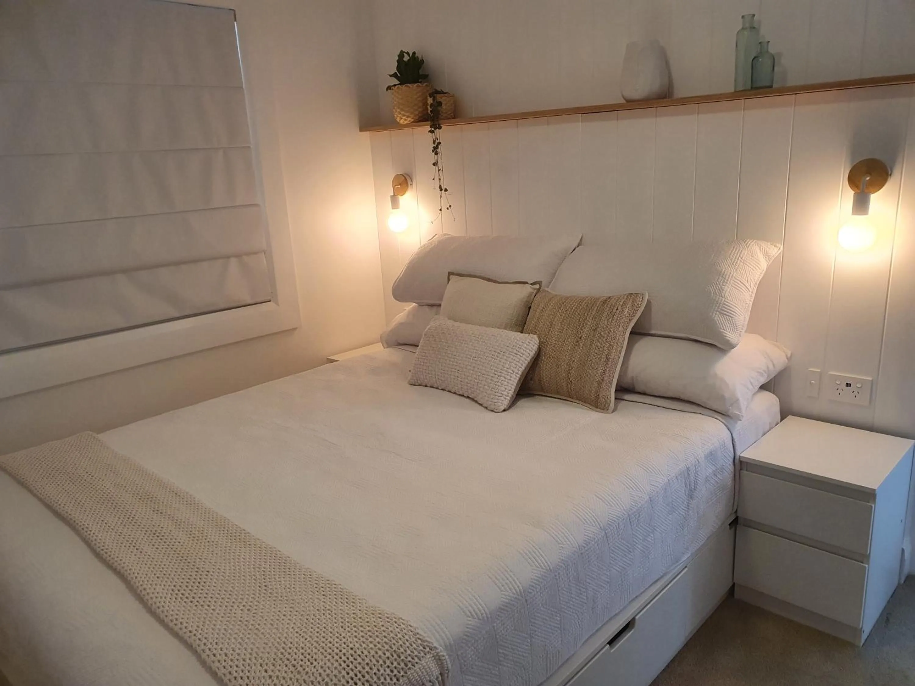 Bed in Saltwater Apartments