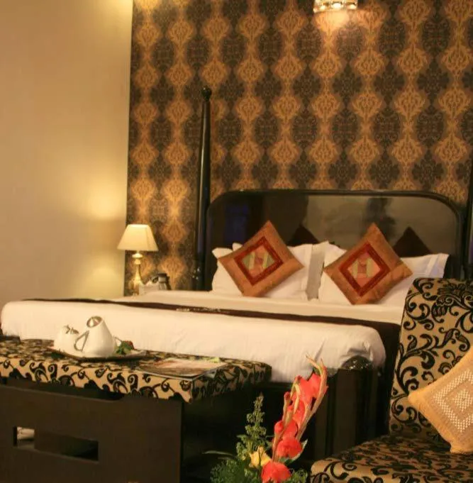 Photo of the whole room, Bed in The Ambassador - Hotel & Conference Center