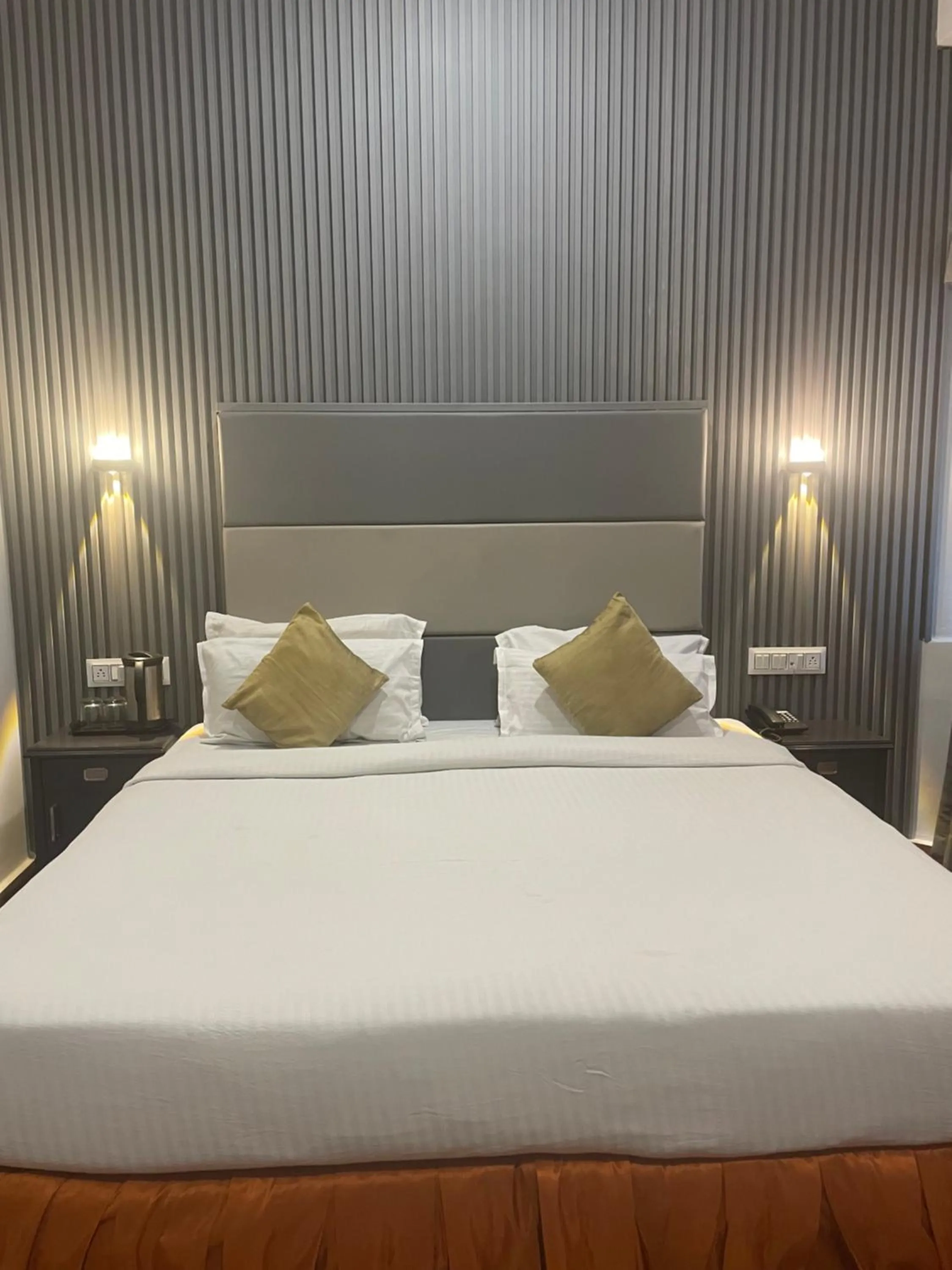 Bed in The Ambassador - Hotel & Conference Center