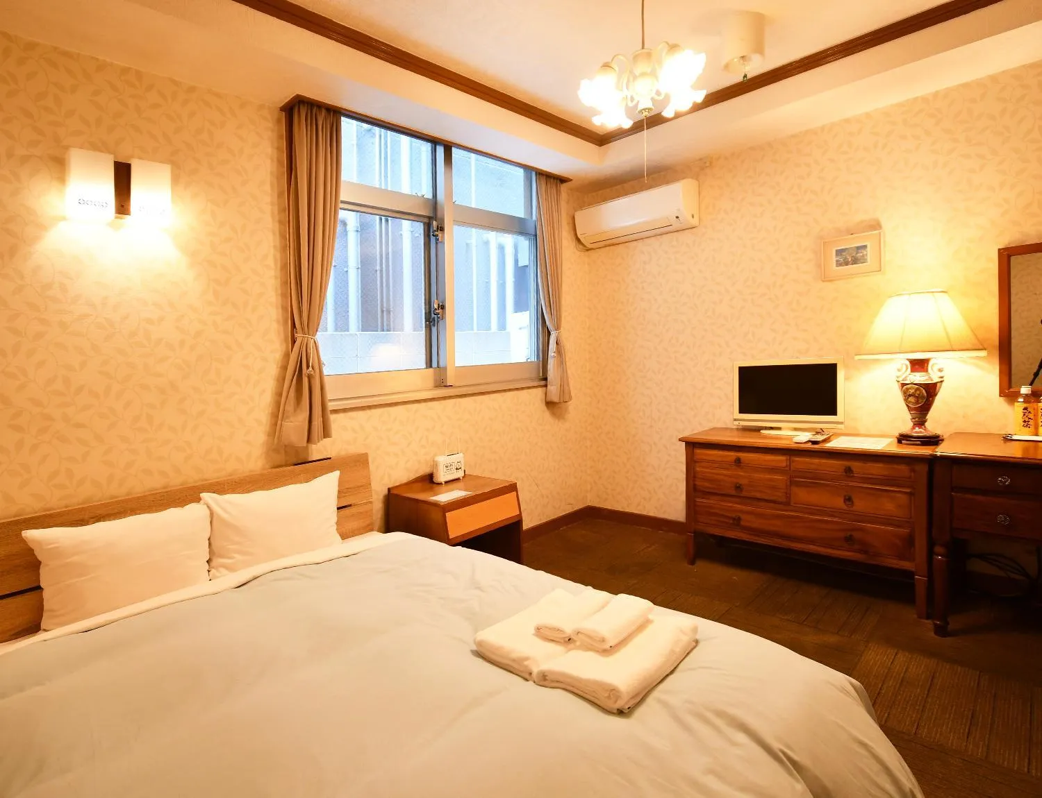 Bed in Sunrise Hotel Okinawa-どこか懐かしいレトロ宿軽朝食付