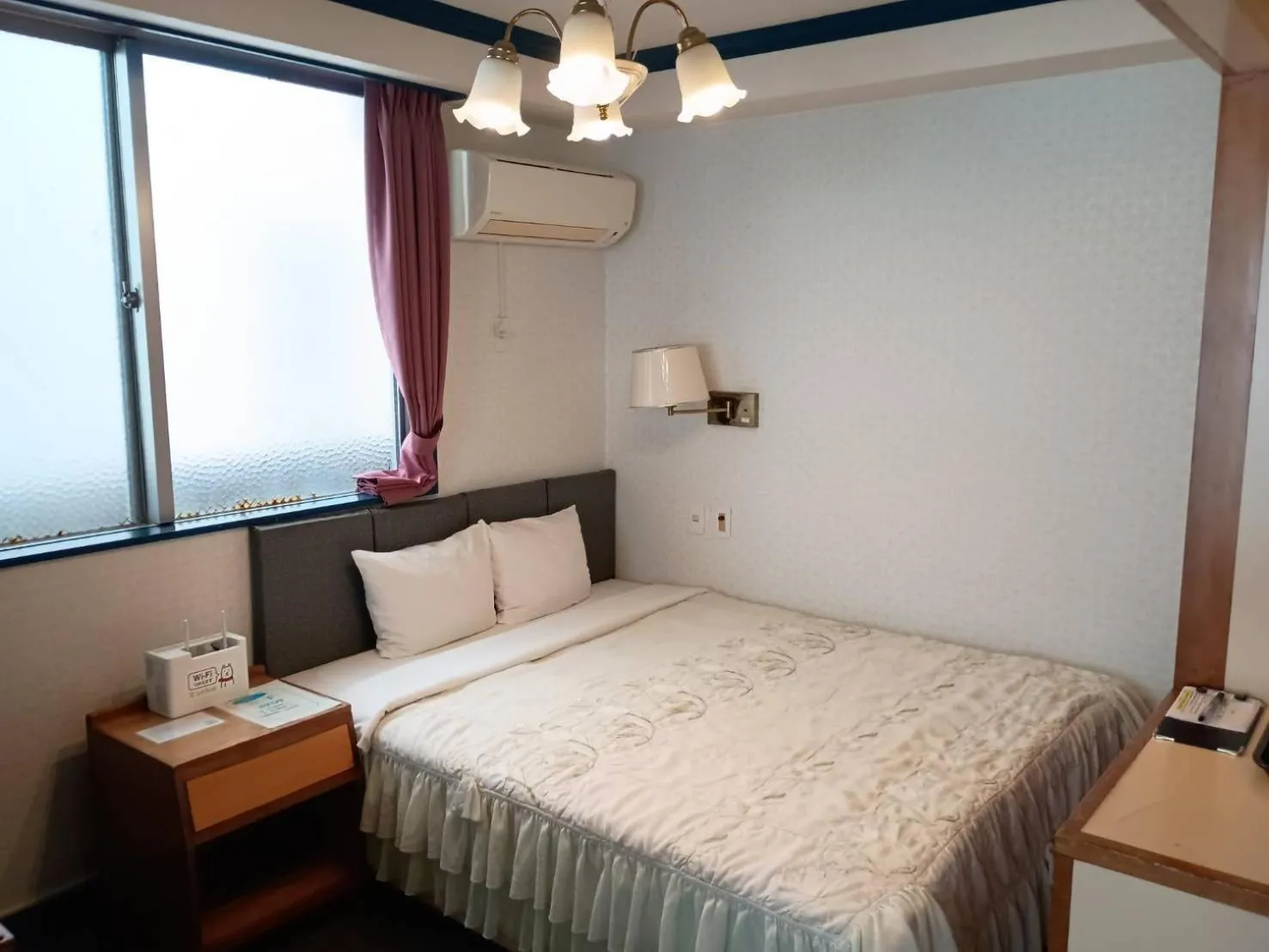 Bed in Sunrise Hotel Okinawa-どこか懐かしいレトロ宿軽朝食付