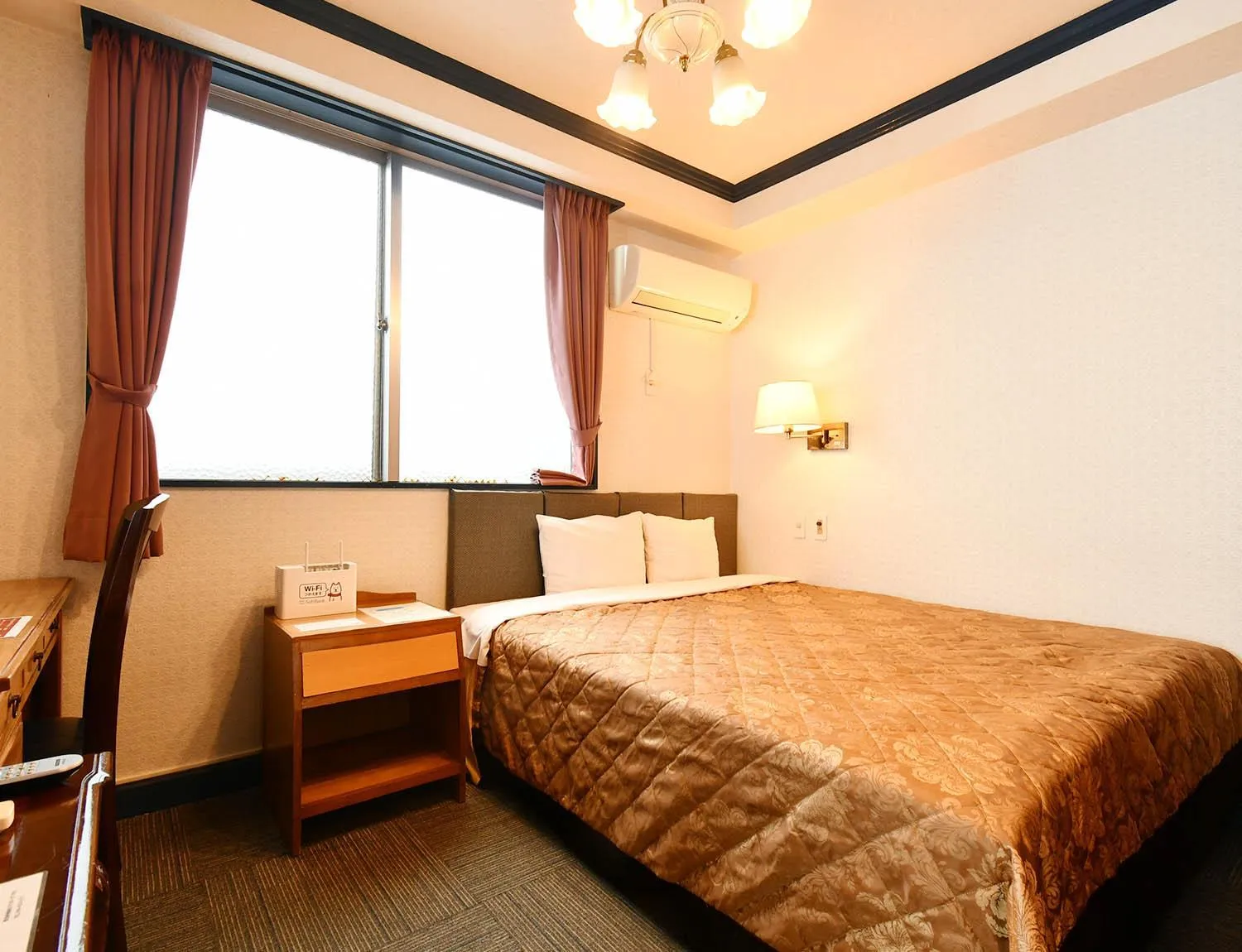 Bed in Sunrise Hotel Okinawa-どこか懐かしいレトロ宿軽朝食付